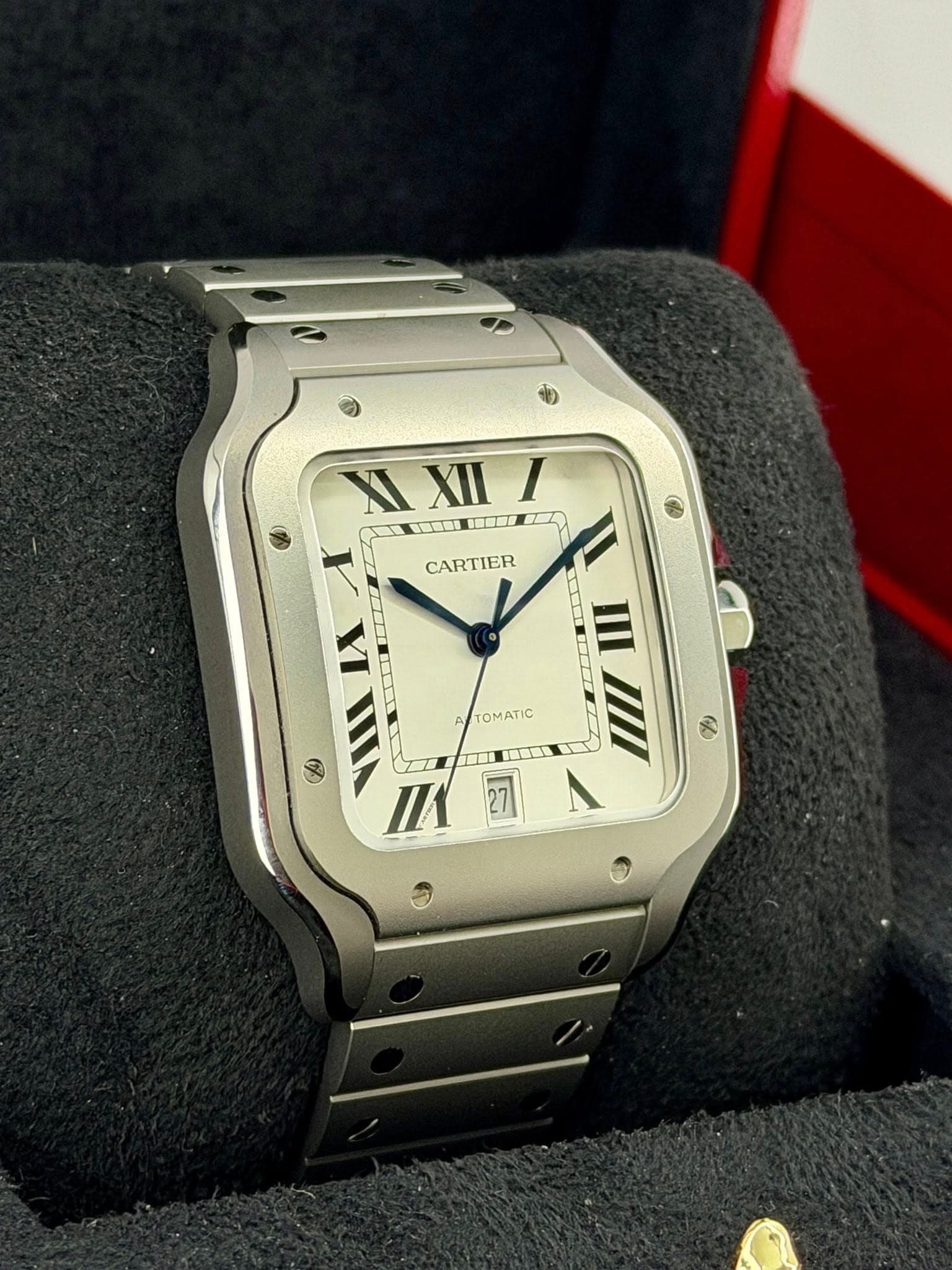 May be an image of wrist watch and text