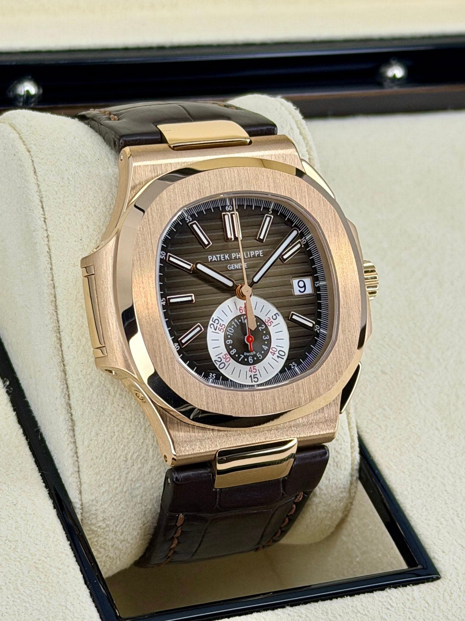 May be an image of wrist watch and text