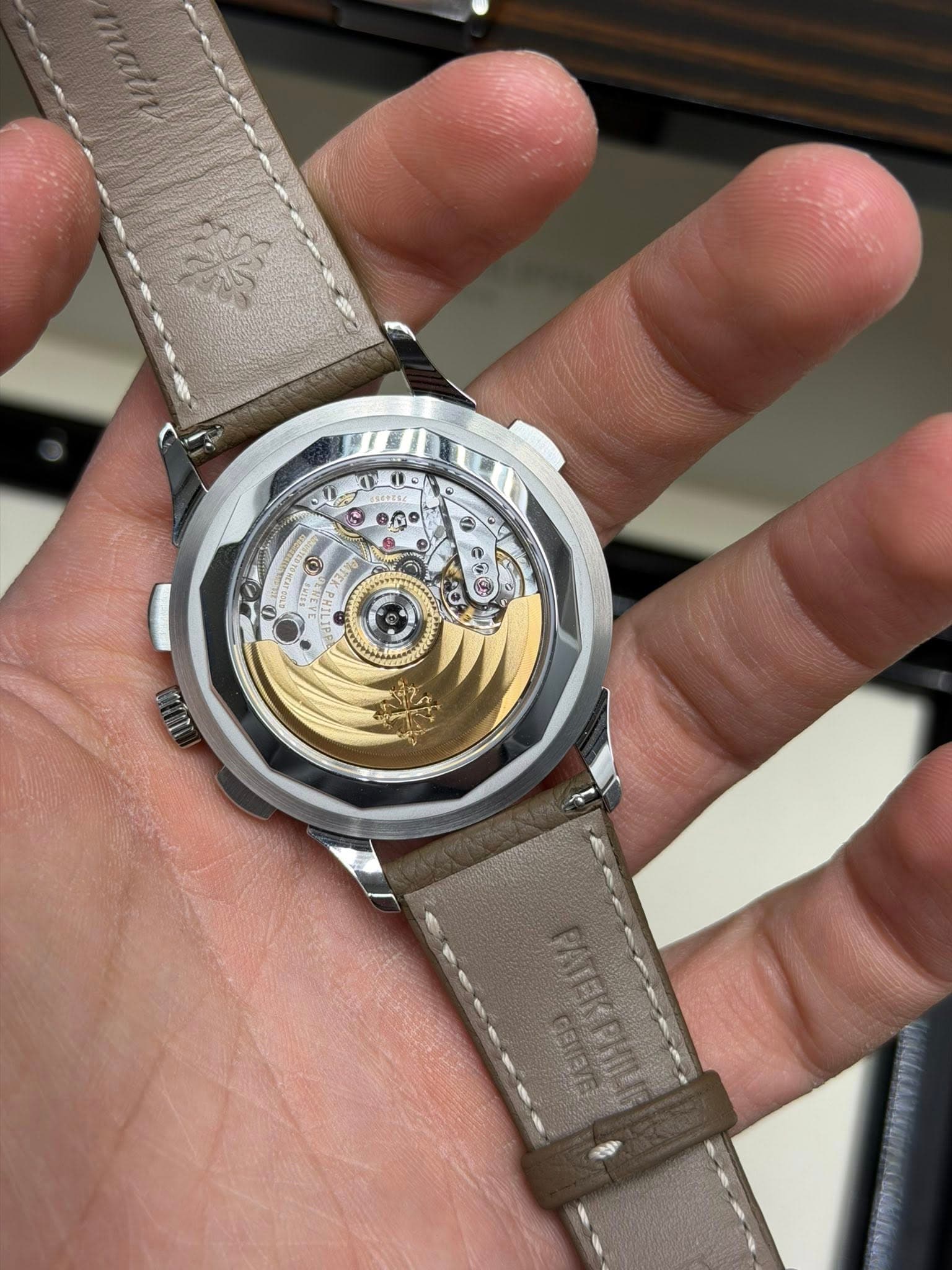 May be an image of wrist watch and text