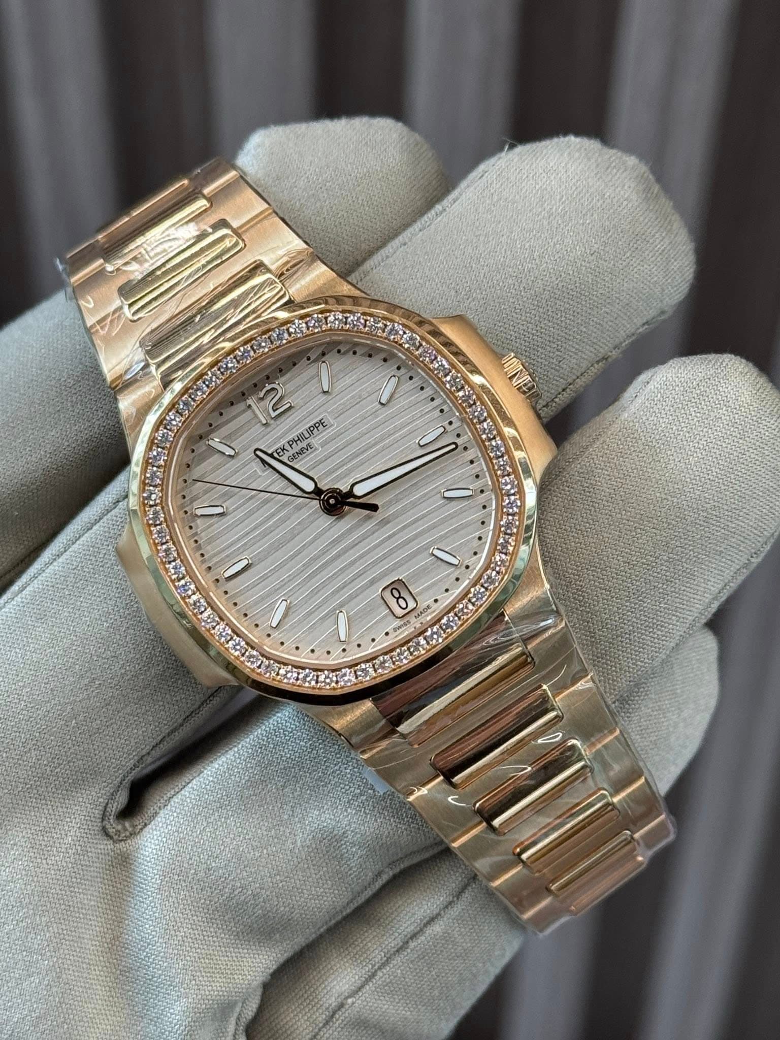 May be an image of wrist watch and text