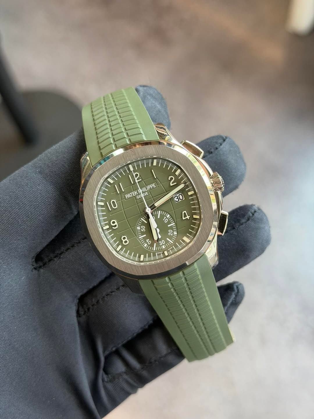 May be an image of wrist watch and text