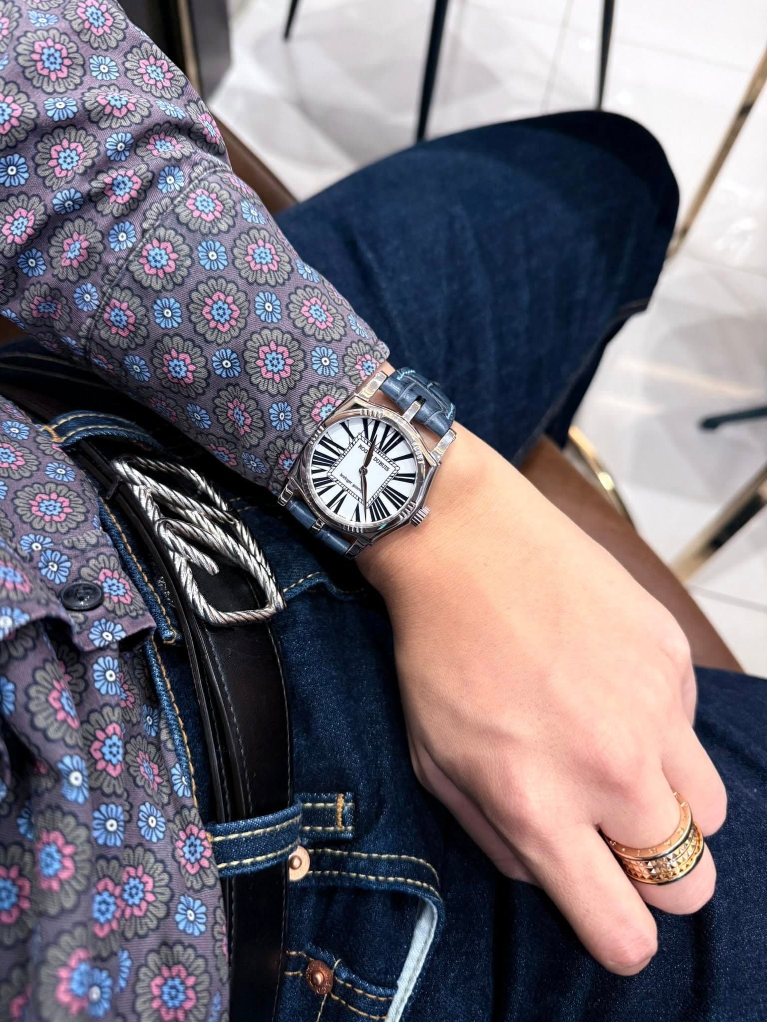 May be an image of wrist watch