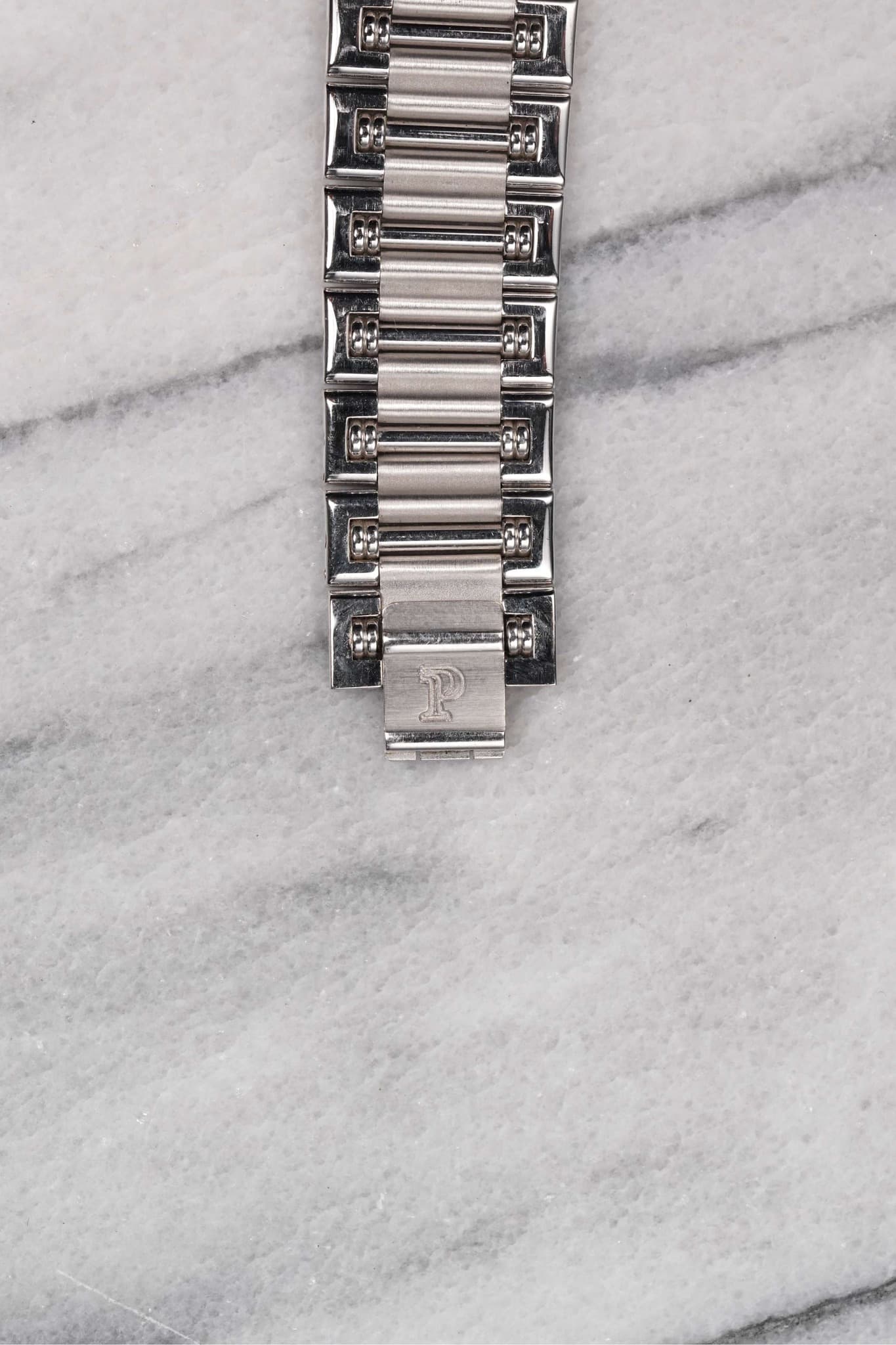 May be an image of wrist watch