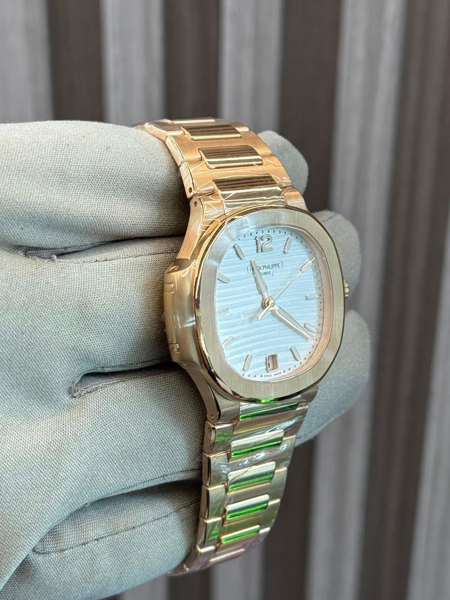 May be an image of wrist watch and text