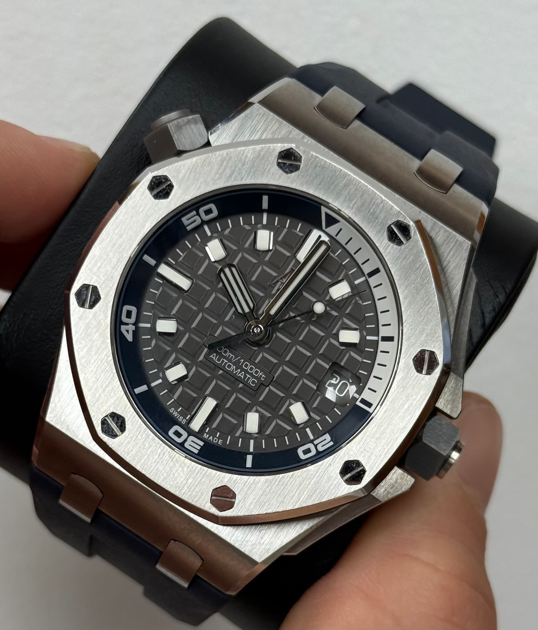 May be an image of wrist watch and text