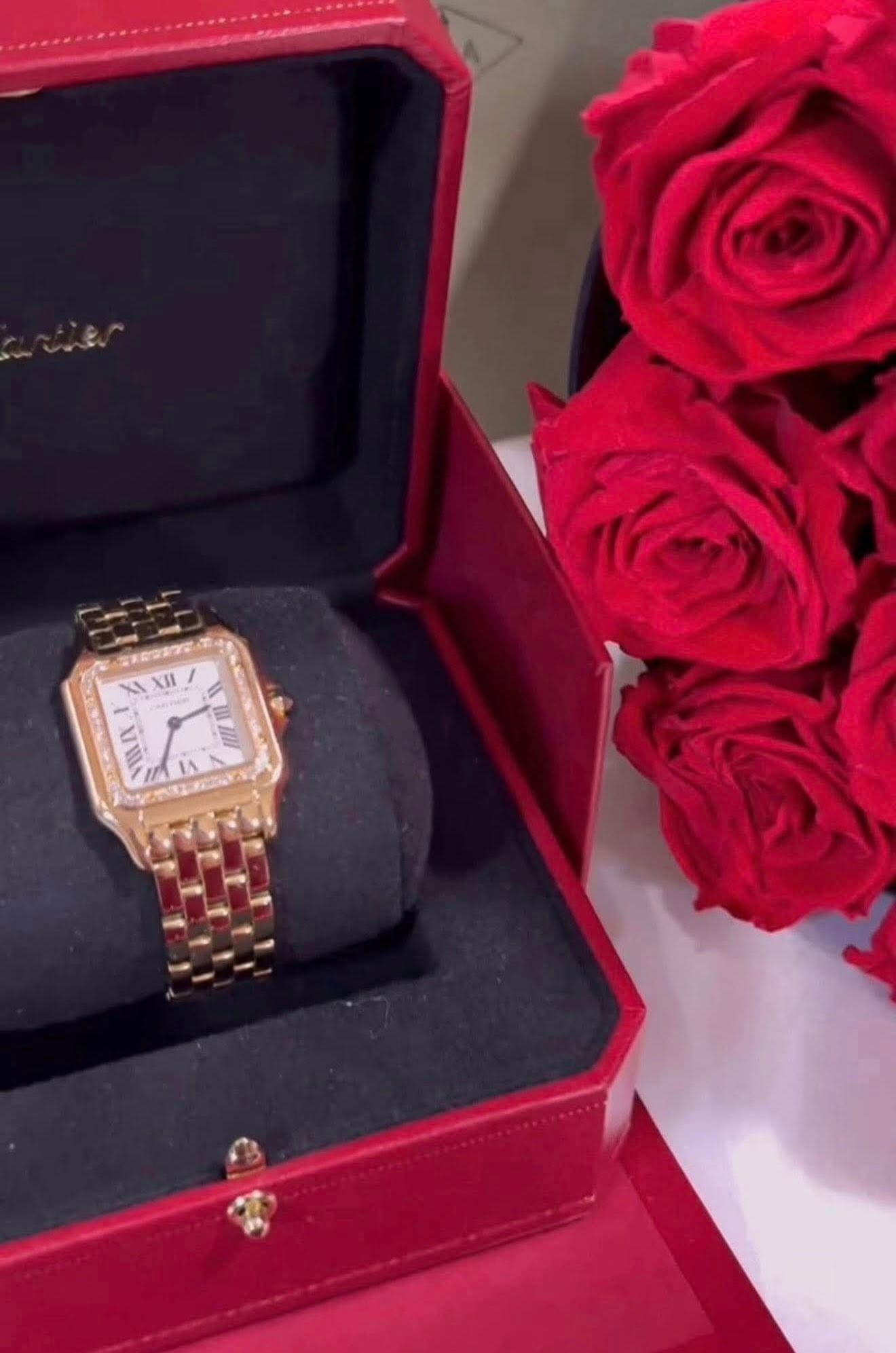May be an image of jewelry, wrist watch and text