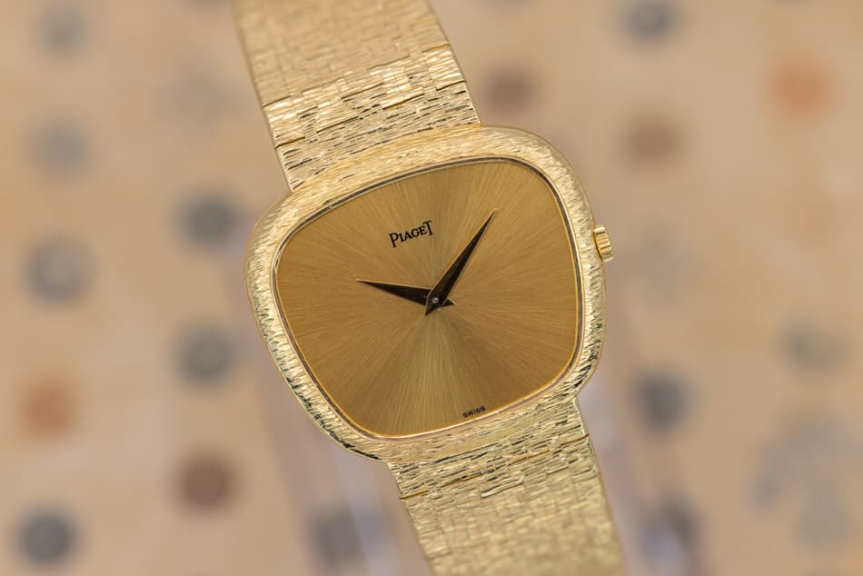 May be an image of digital watch and text that says 'PIAGET PIAGET'