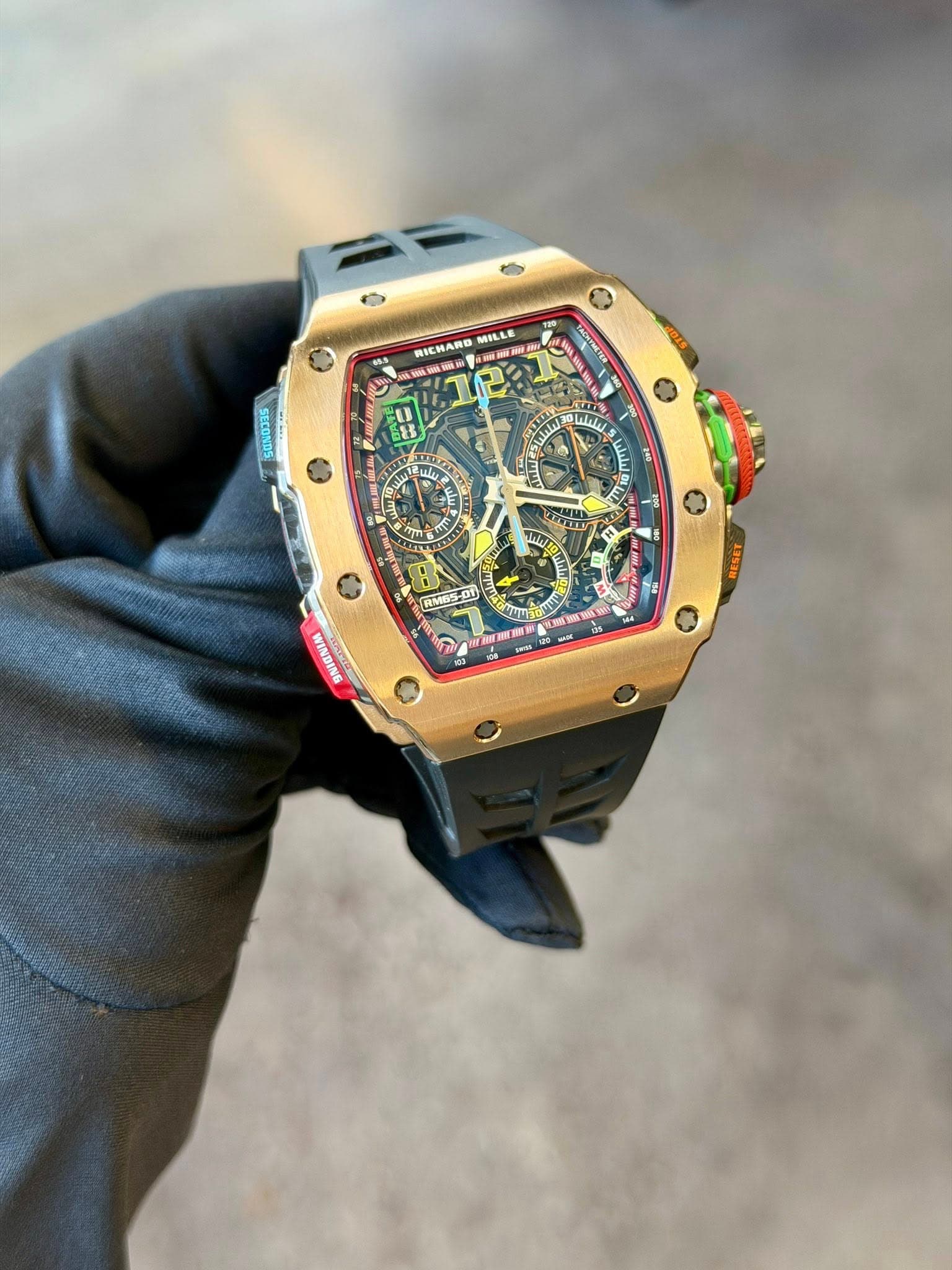 May be an image of wrist watch and text