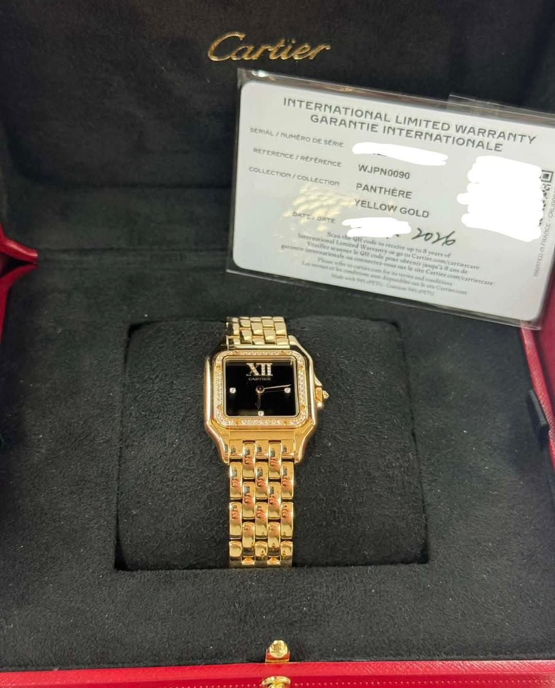 May be an image of wrist watch and text