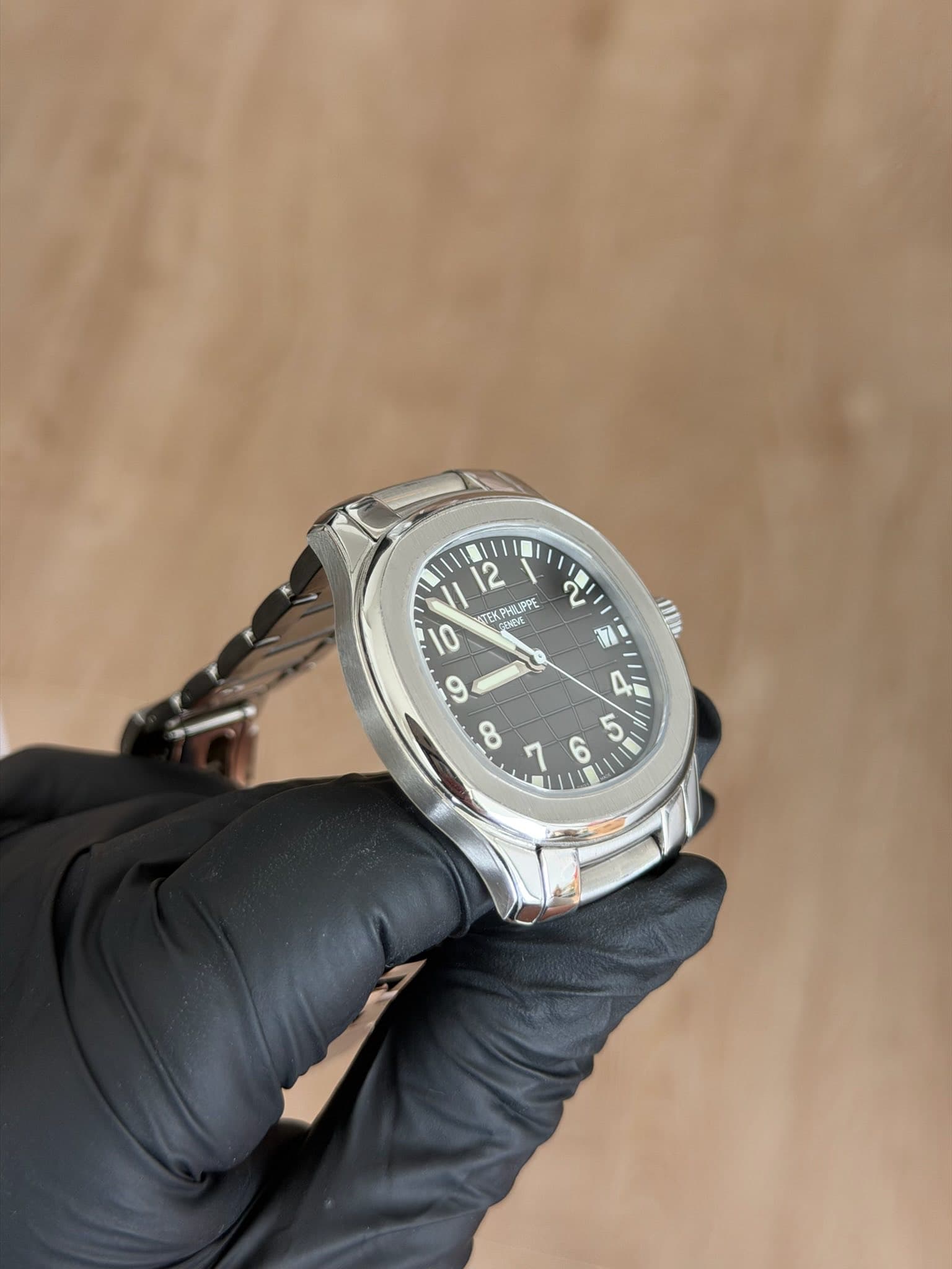 May be an image of wrist watch and text