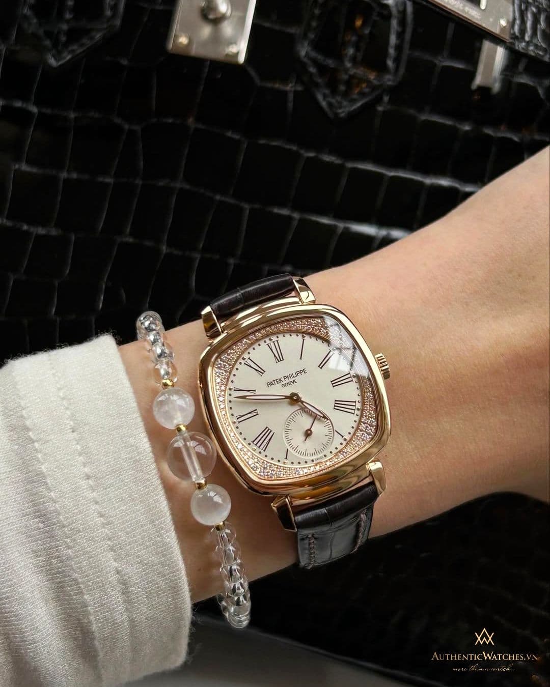 May be an image of jewelry, wrist watch and text