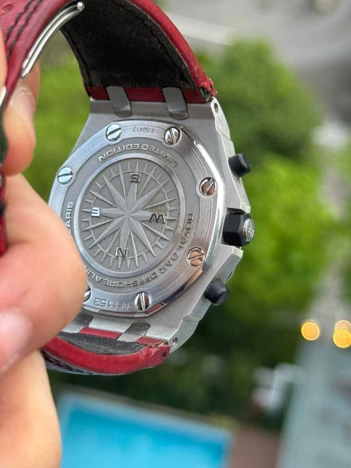 May be an image of wrist watch and text