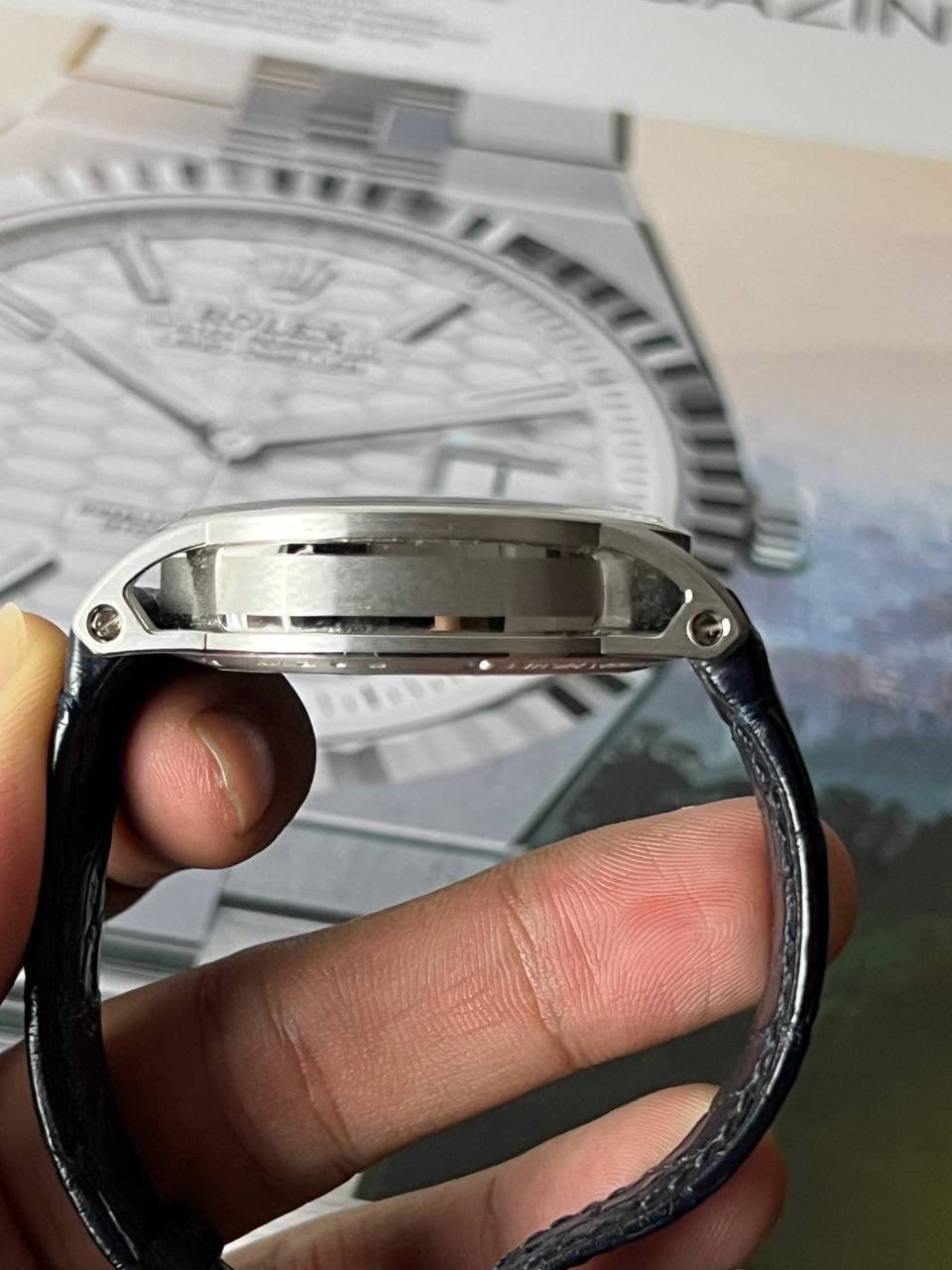 May be an image of digital watch and text
