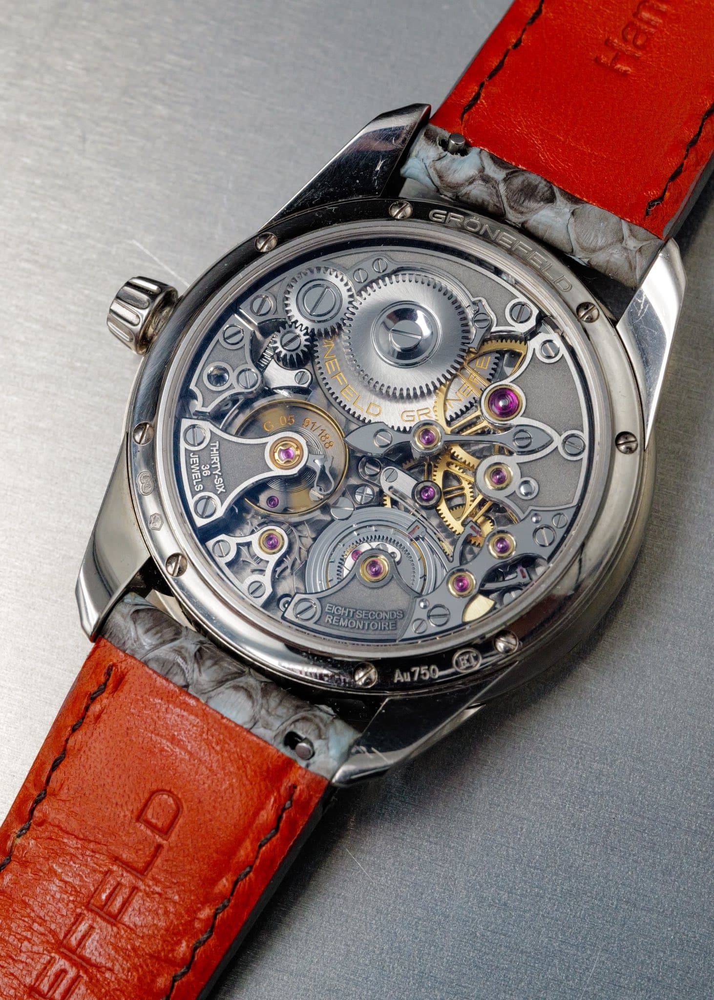 May be an image of wrist watch and text that says 'መኦ GRON แ Aи 01/188 Ο RTY-SIX THIRTY-SIX JEWELS 0 EKGHTSECOND ORENTOE Eler REMONTOIRE REMO ECONDS'