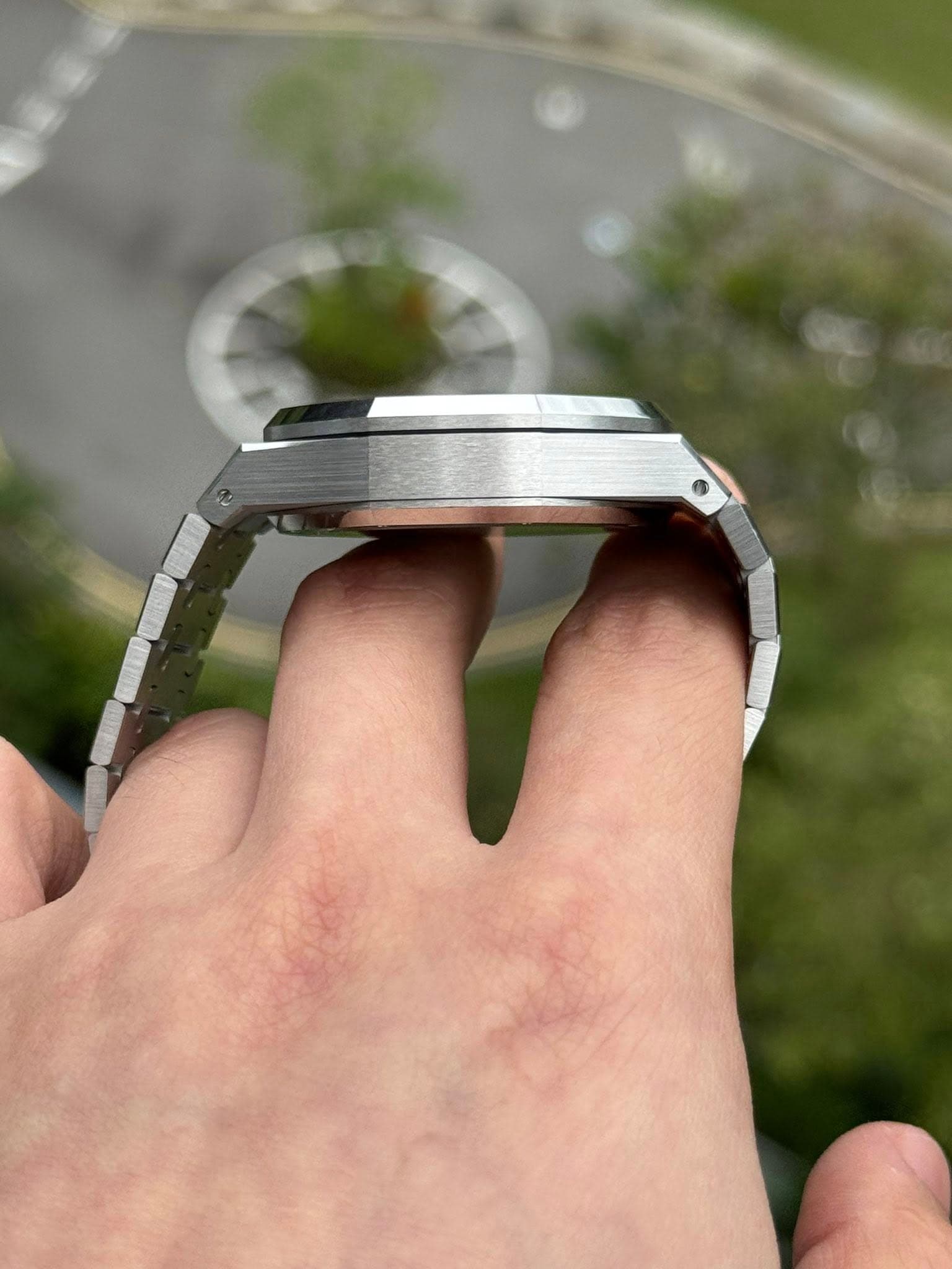 May be an image of digital watch and ring