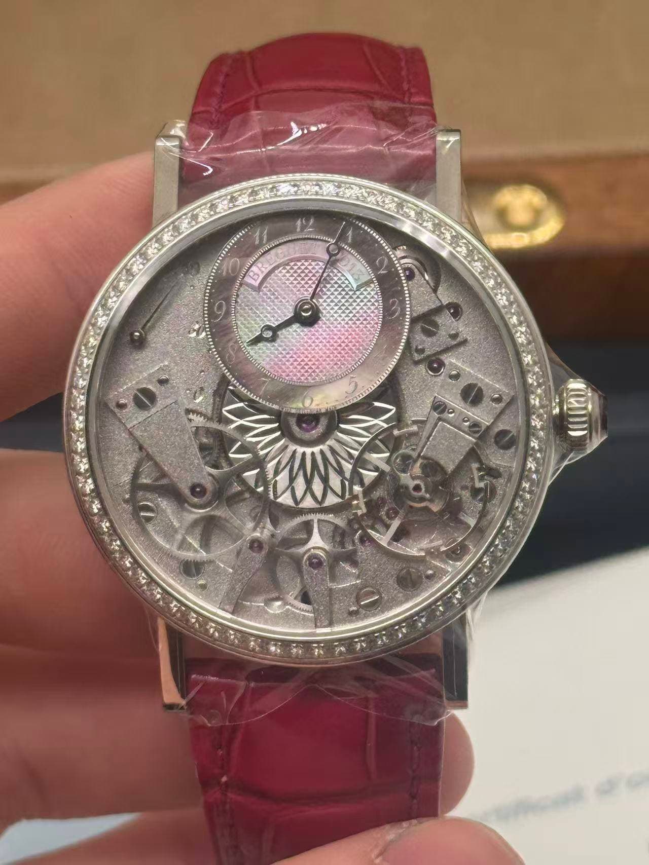 May be an image of wrist watch and text