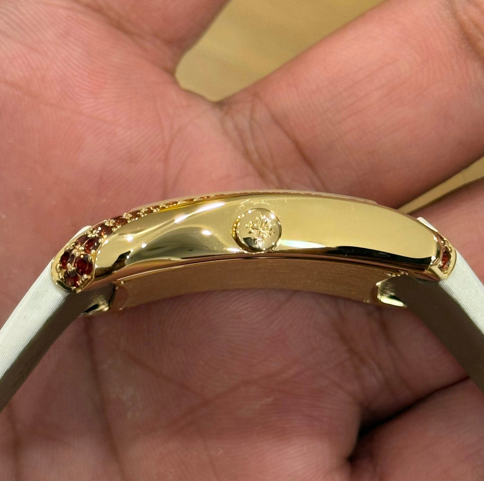 May be an image of wrist watch