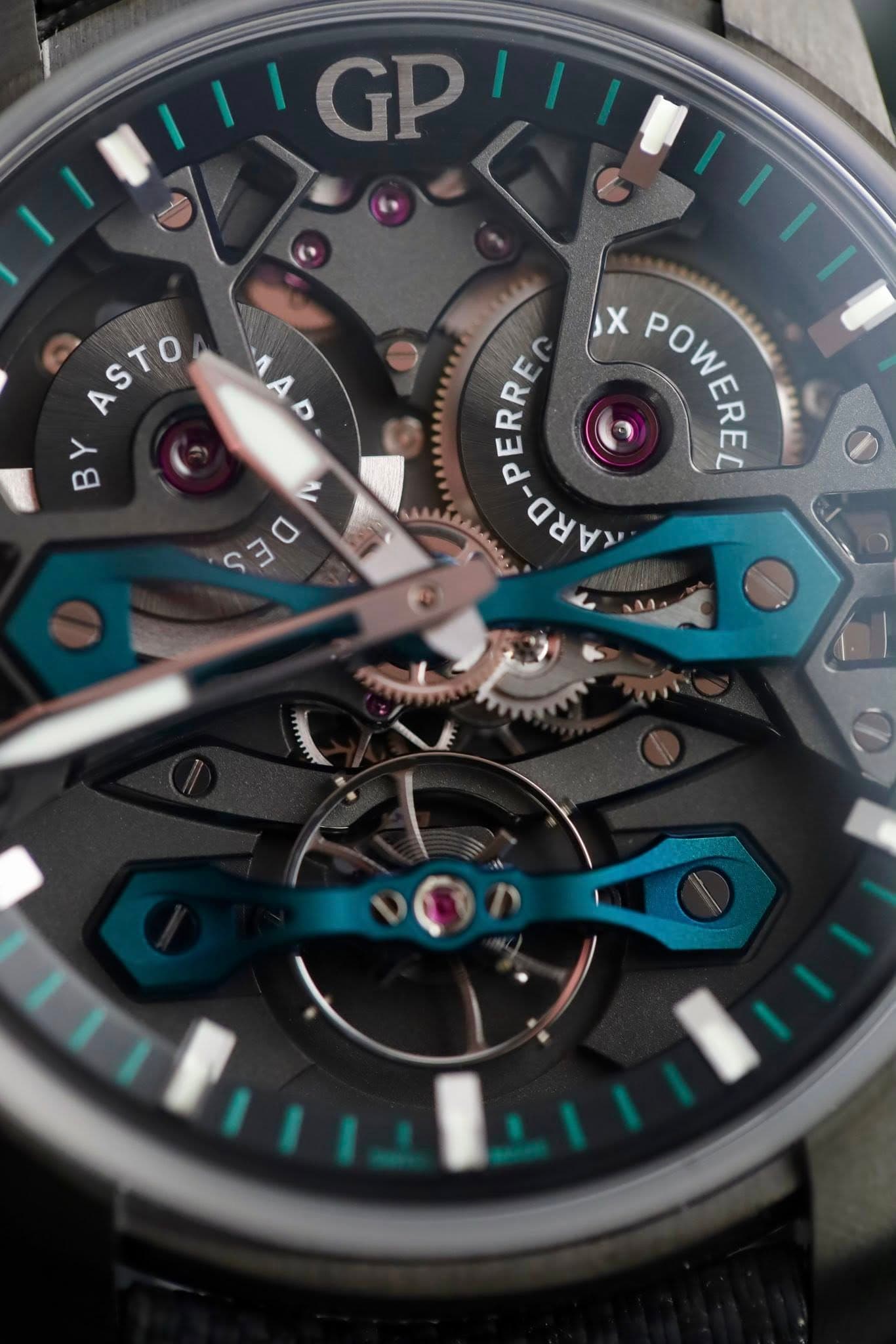 May be an image of wrist watch and text that says 'GP A D ASTO BY 0 B Y 2 DES X POWEREL 56 D-PERRE'