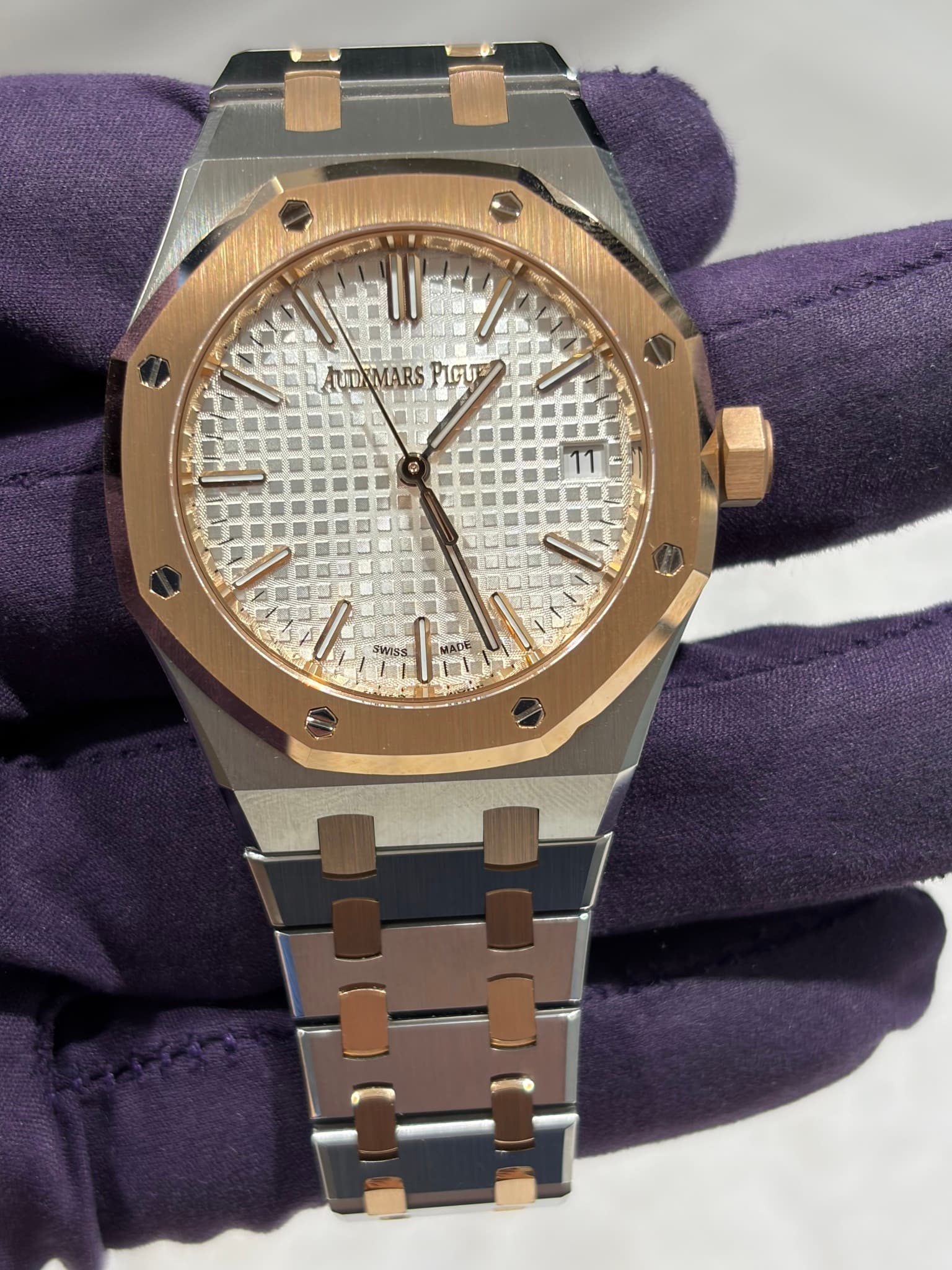 May be an image of wrist watch and text