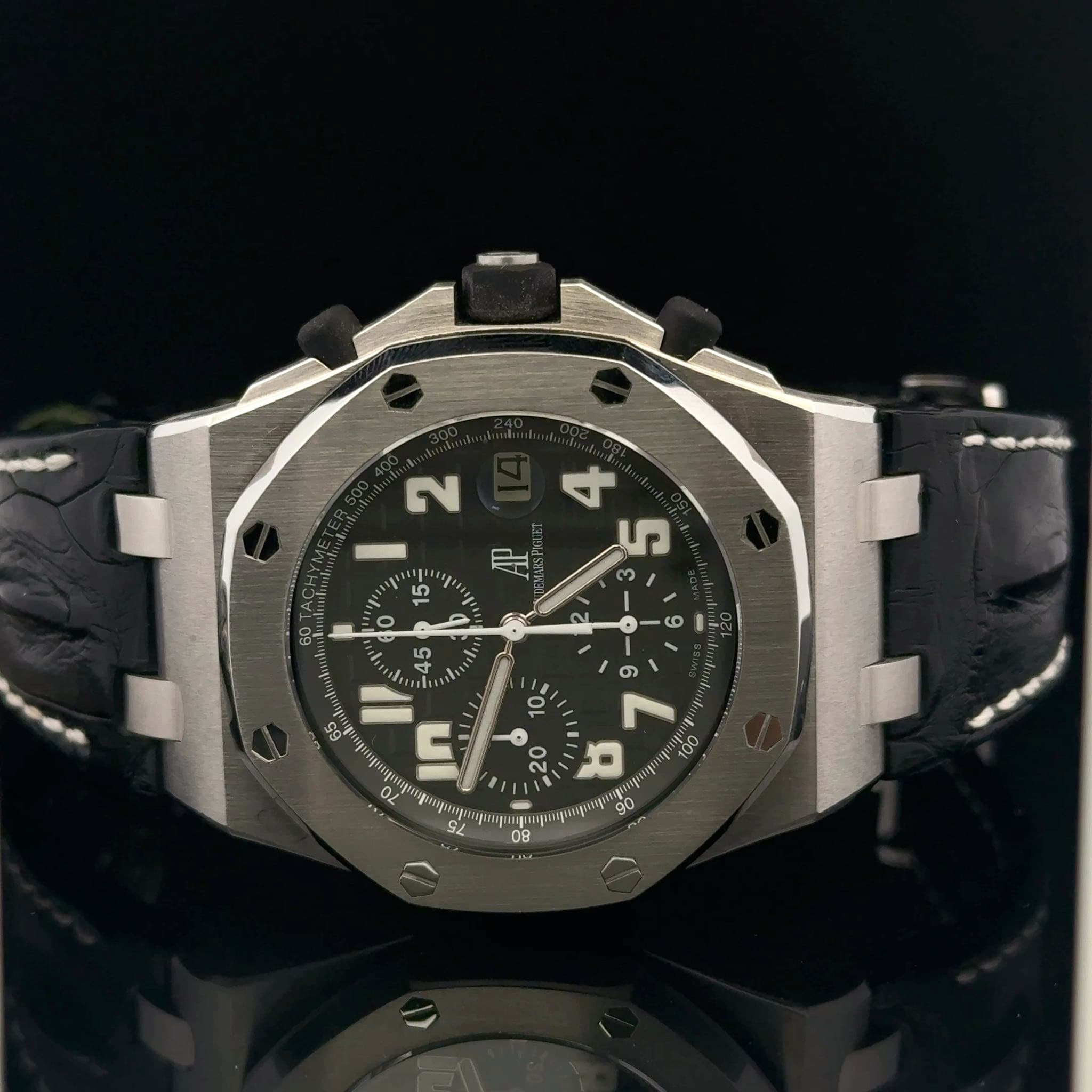 May be an image of wrist watch and text
