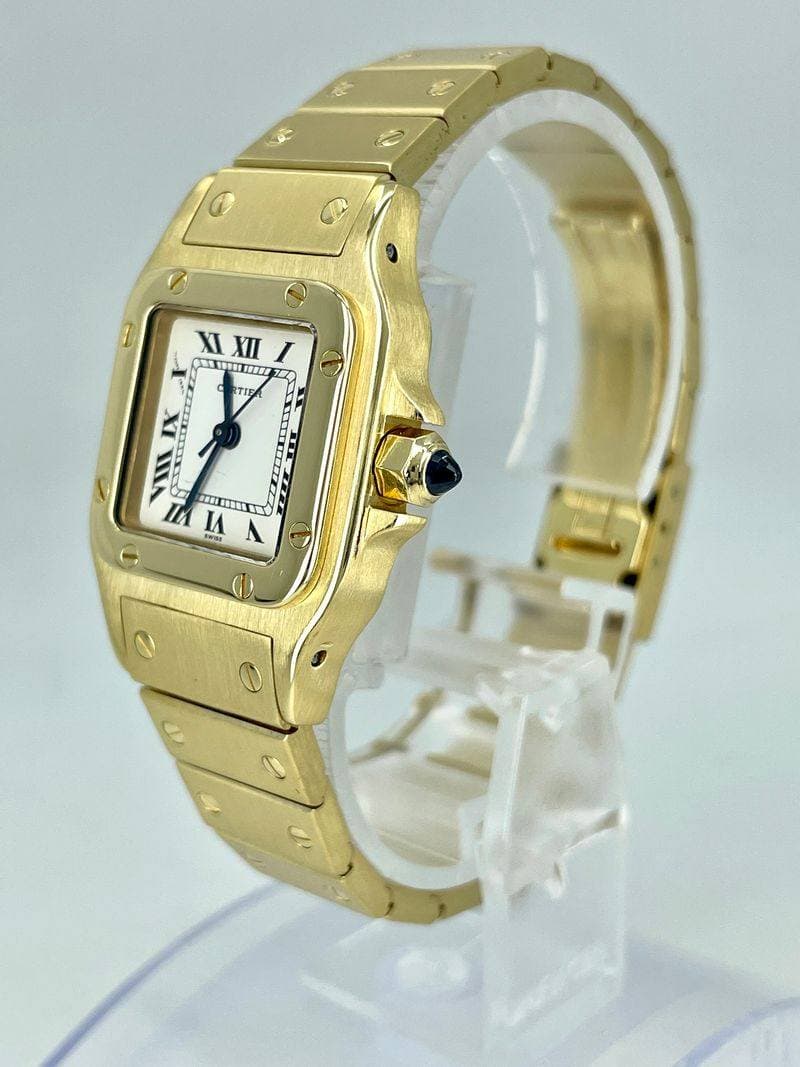 May be an image of digital watch, jewelry and text