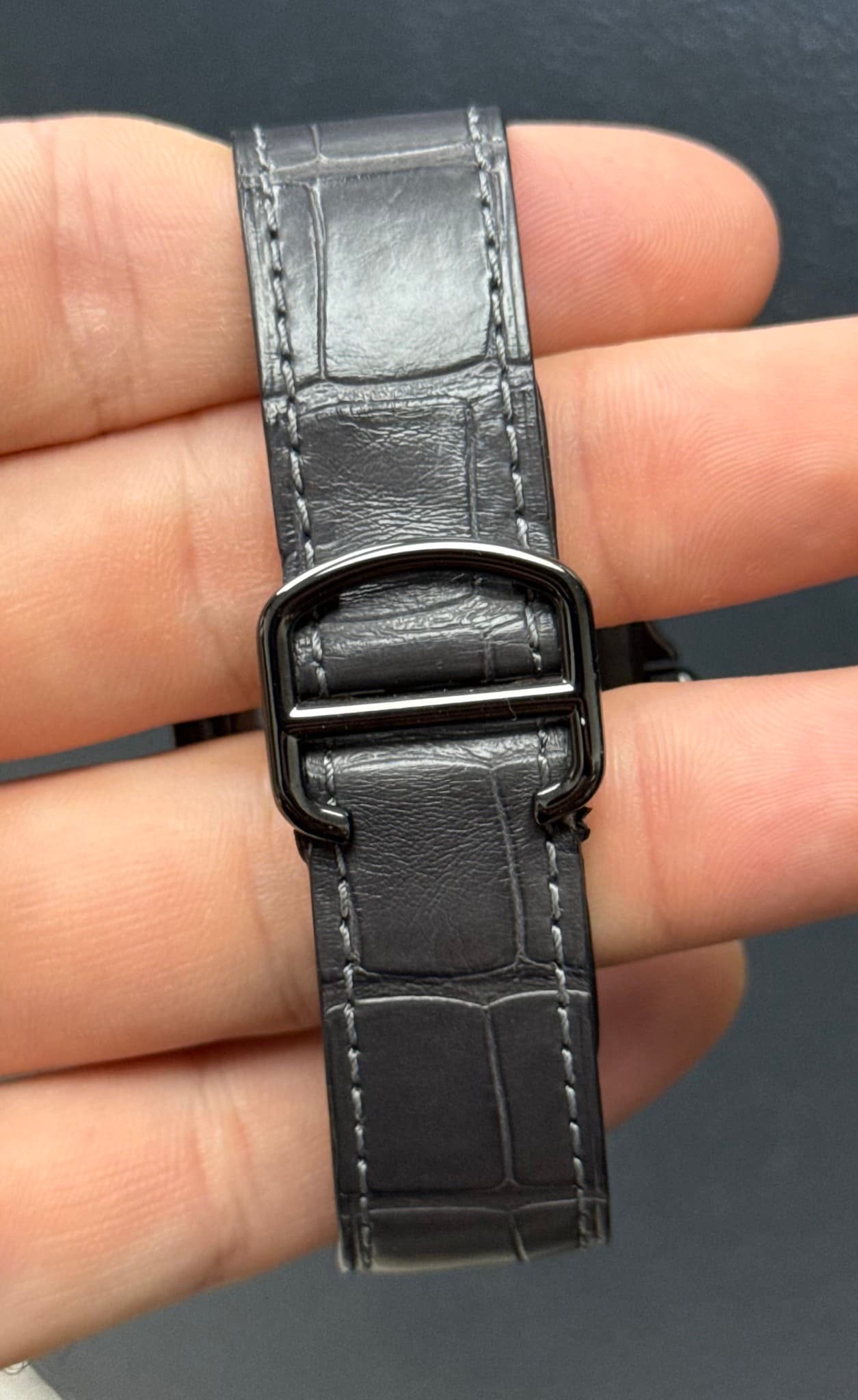 May be an image of leather and wrist watch