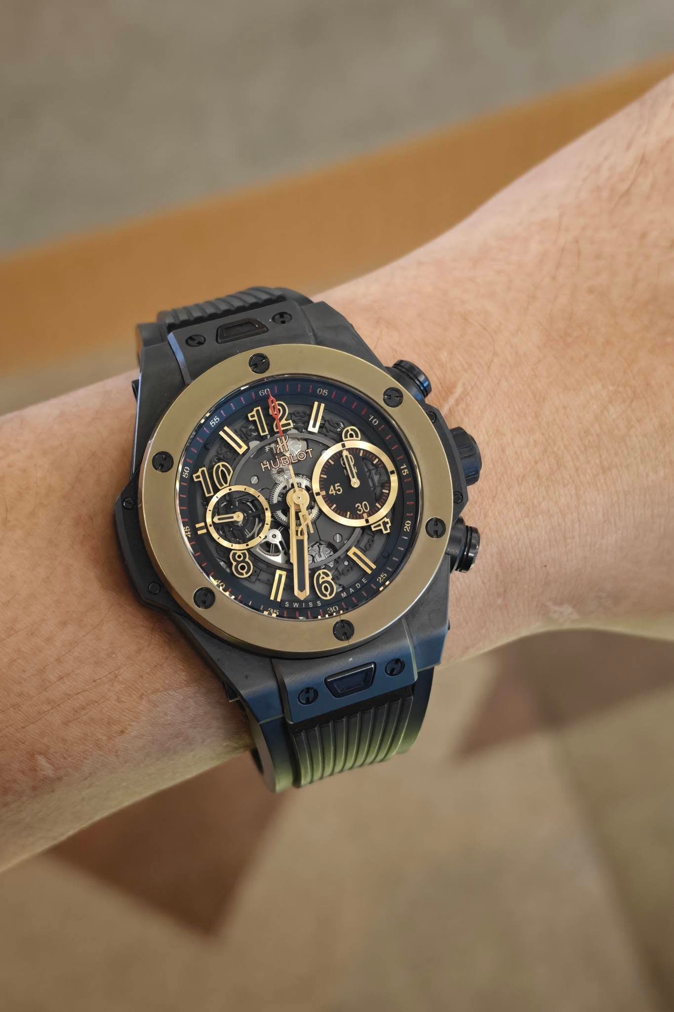 May be an image of wrist watch and text