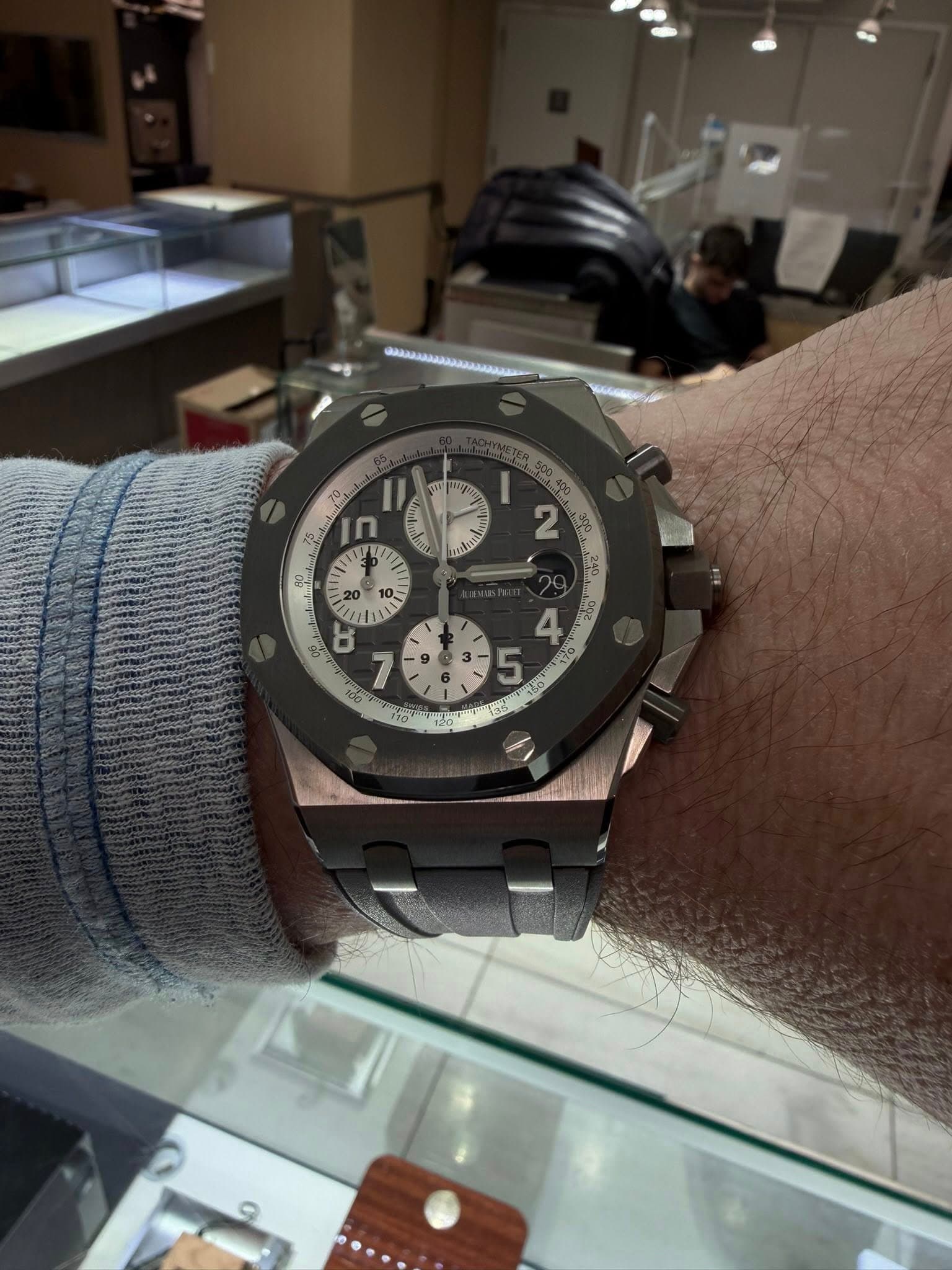 May be an image of wrist watch and text