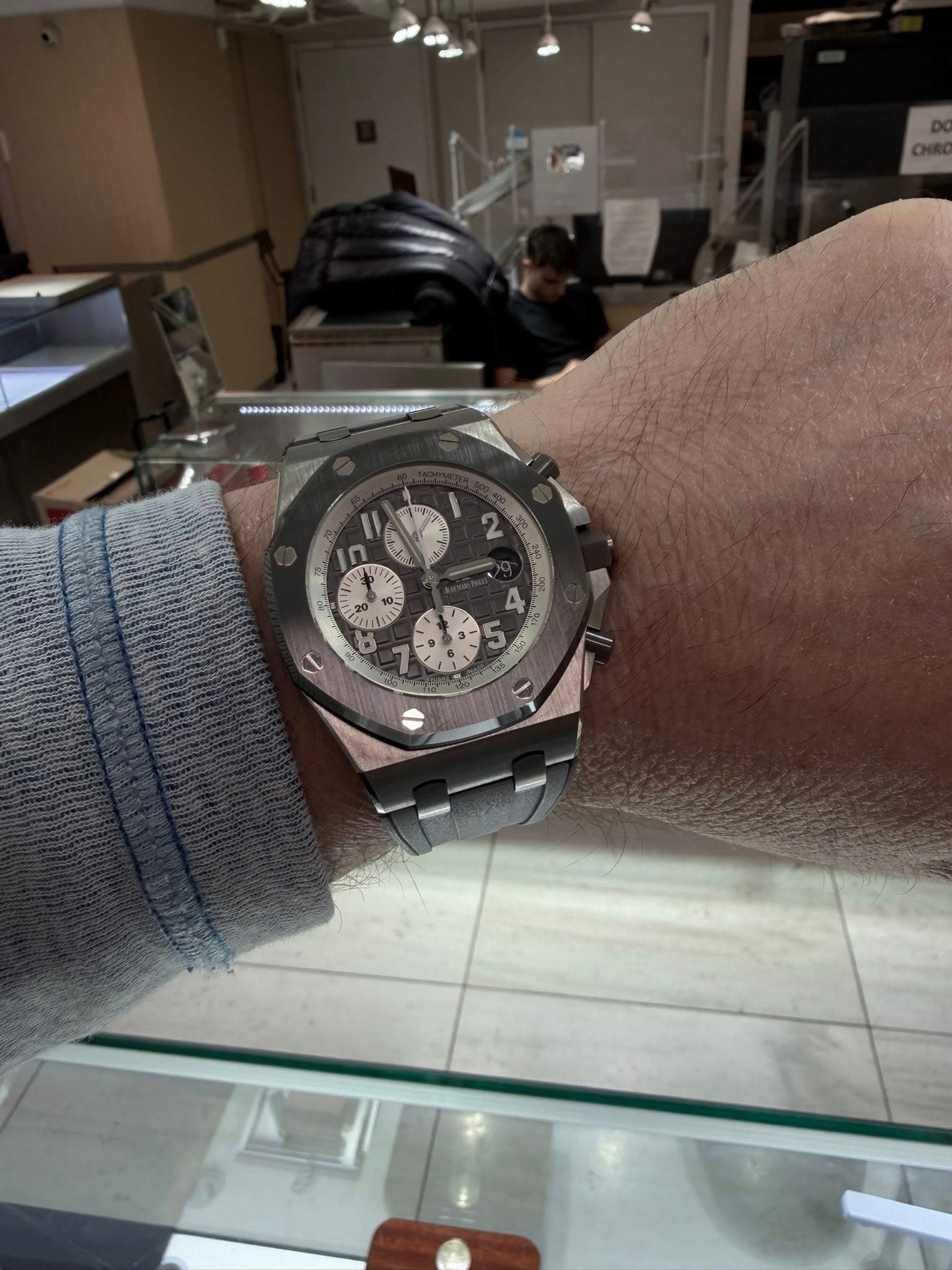 May be an image of wrist watch and text