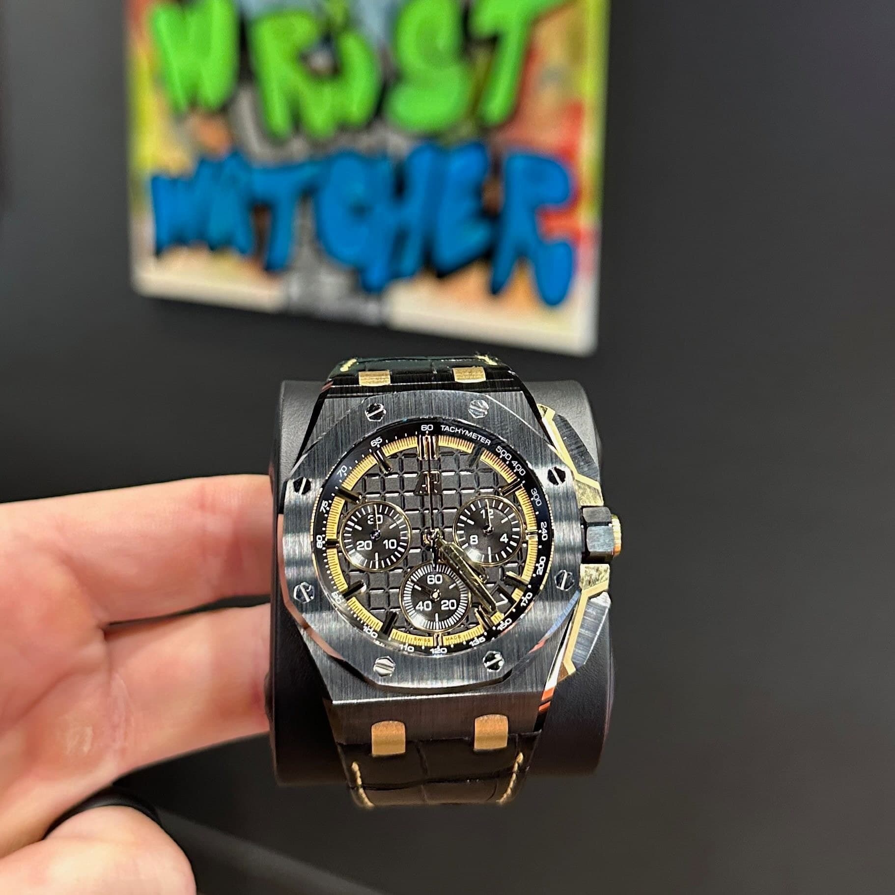 May be an image of wrist watch and text