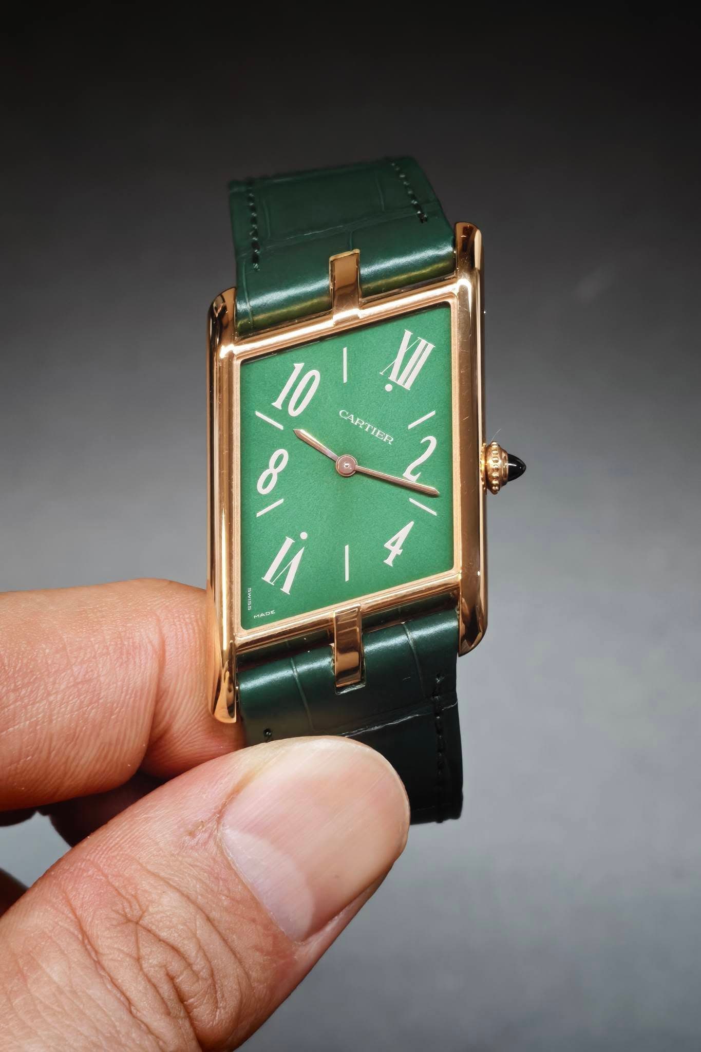 May be an image of digital watch and text