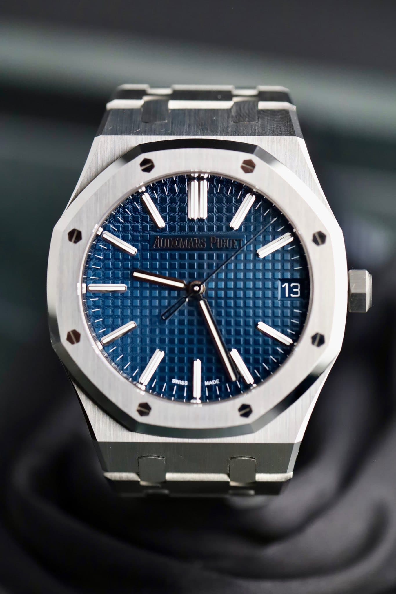 May be an image of wrist watch and text that says 'F 13 1r SWISS MADE'