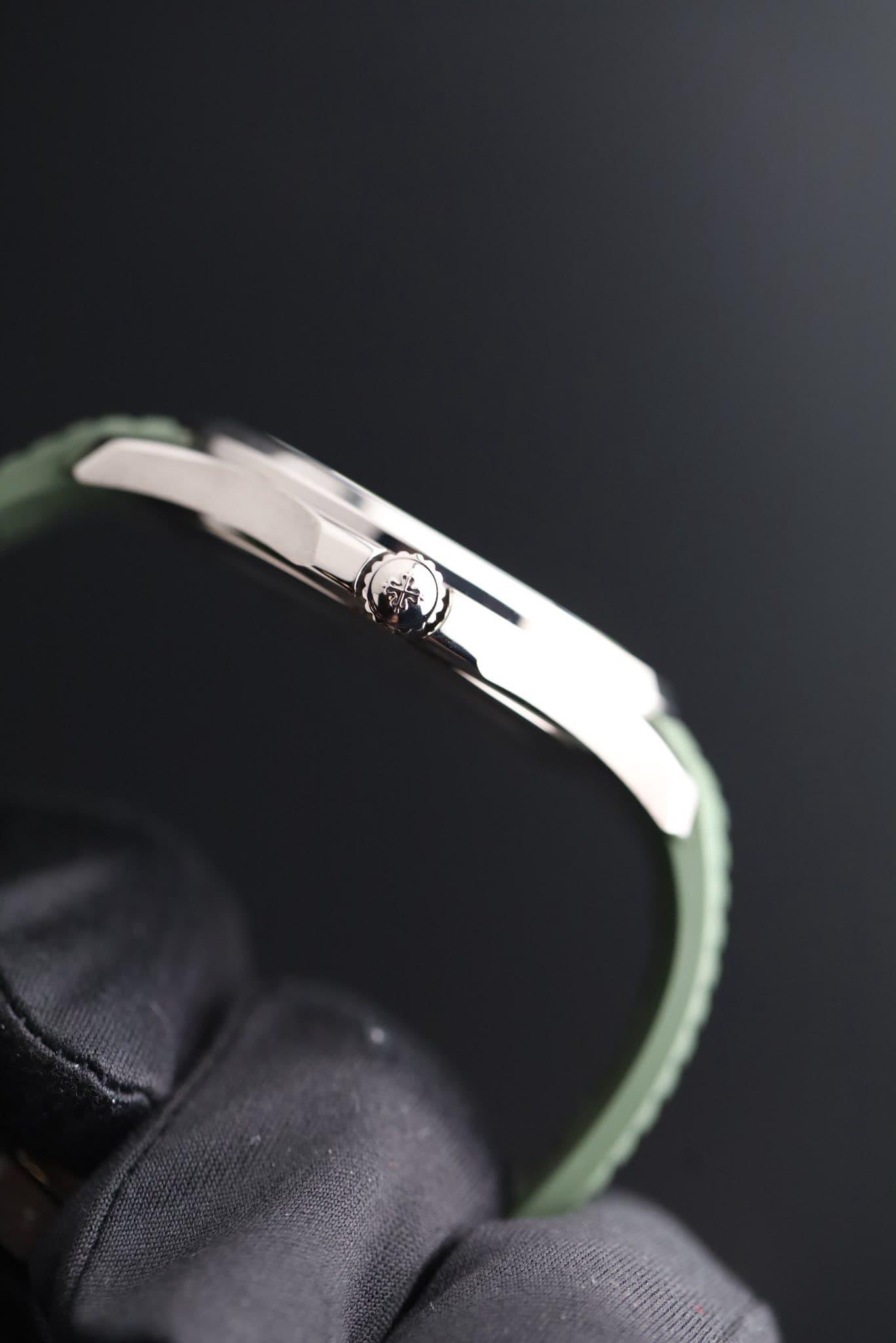 May be an image of wrist watch and ring