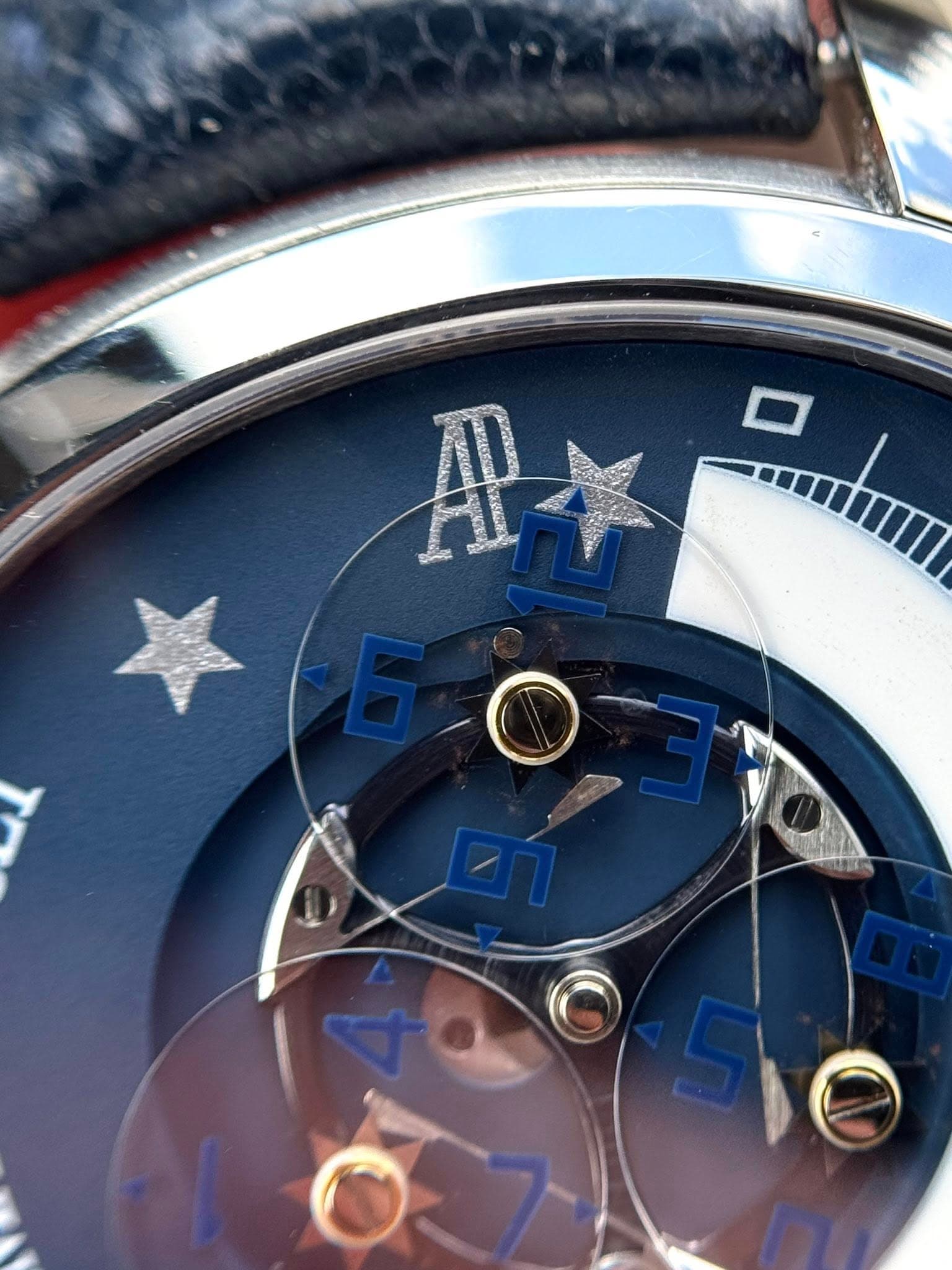 May be an image of wrist watch and text