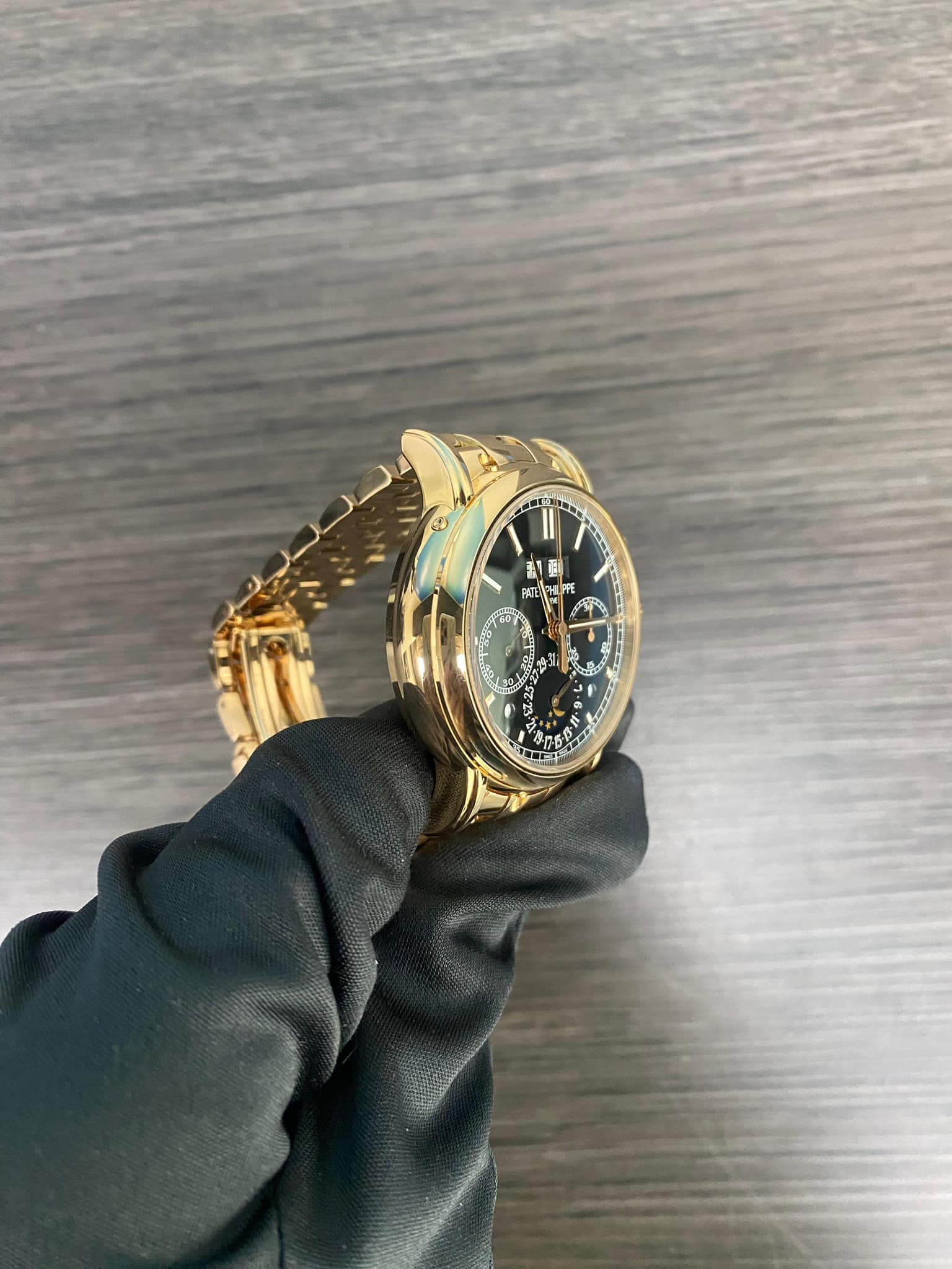 May be an image of ring, wrist watch and brass