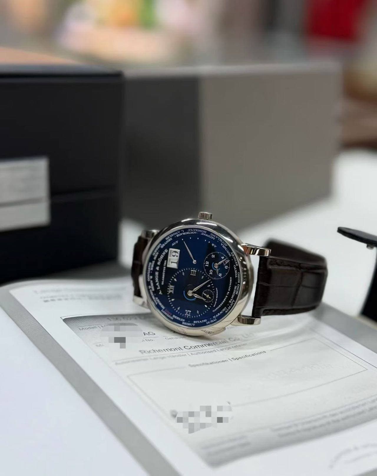 May be an image of wrist watch and text