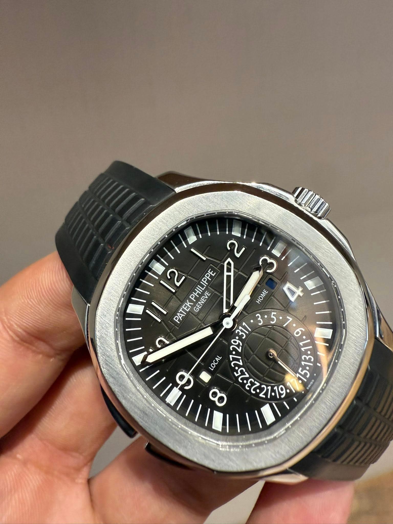 May be an image of wrist watch and text that says '2 2 ب PHILIPPE PATEKPHILIPPE IPPE HOME さ PATEK GENEVE LOCAL ဖ '