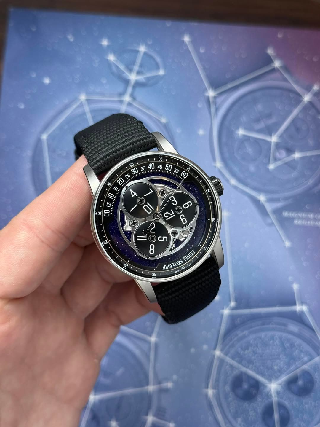 May be an image of map, wrist watch and text
