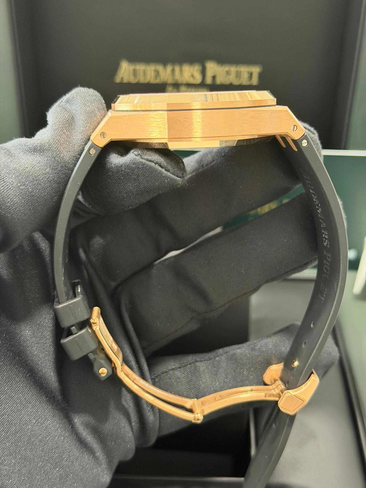 May be an image of wrist watch, brass and text