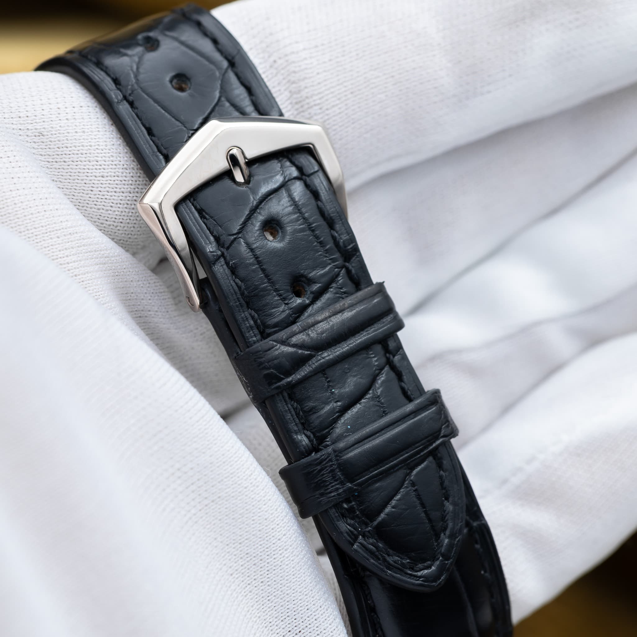 May be an image of wrist watch and leather