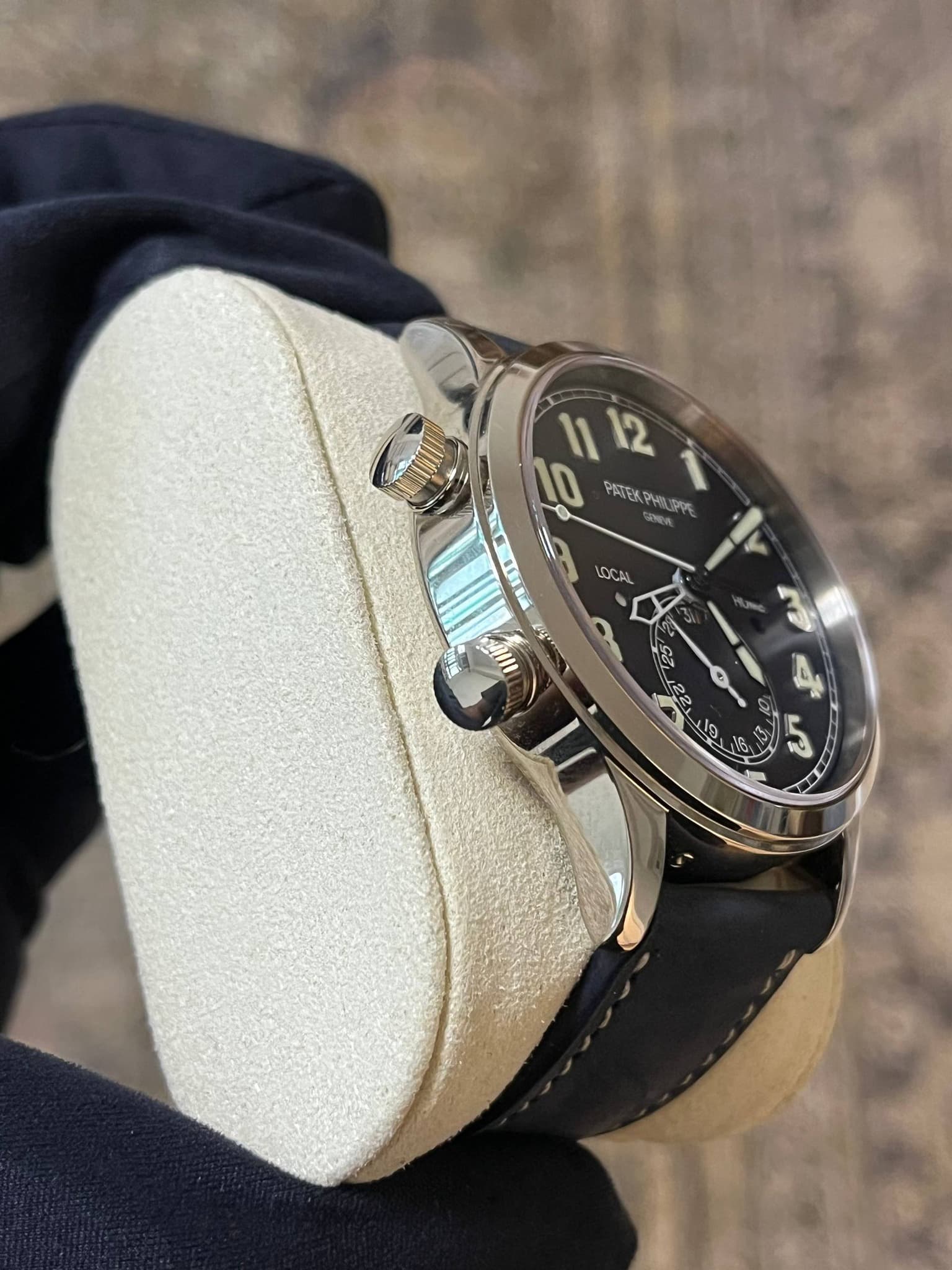 May be an image of wrist watch and text