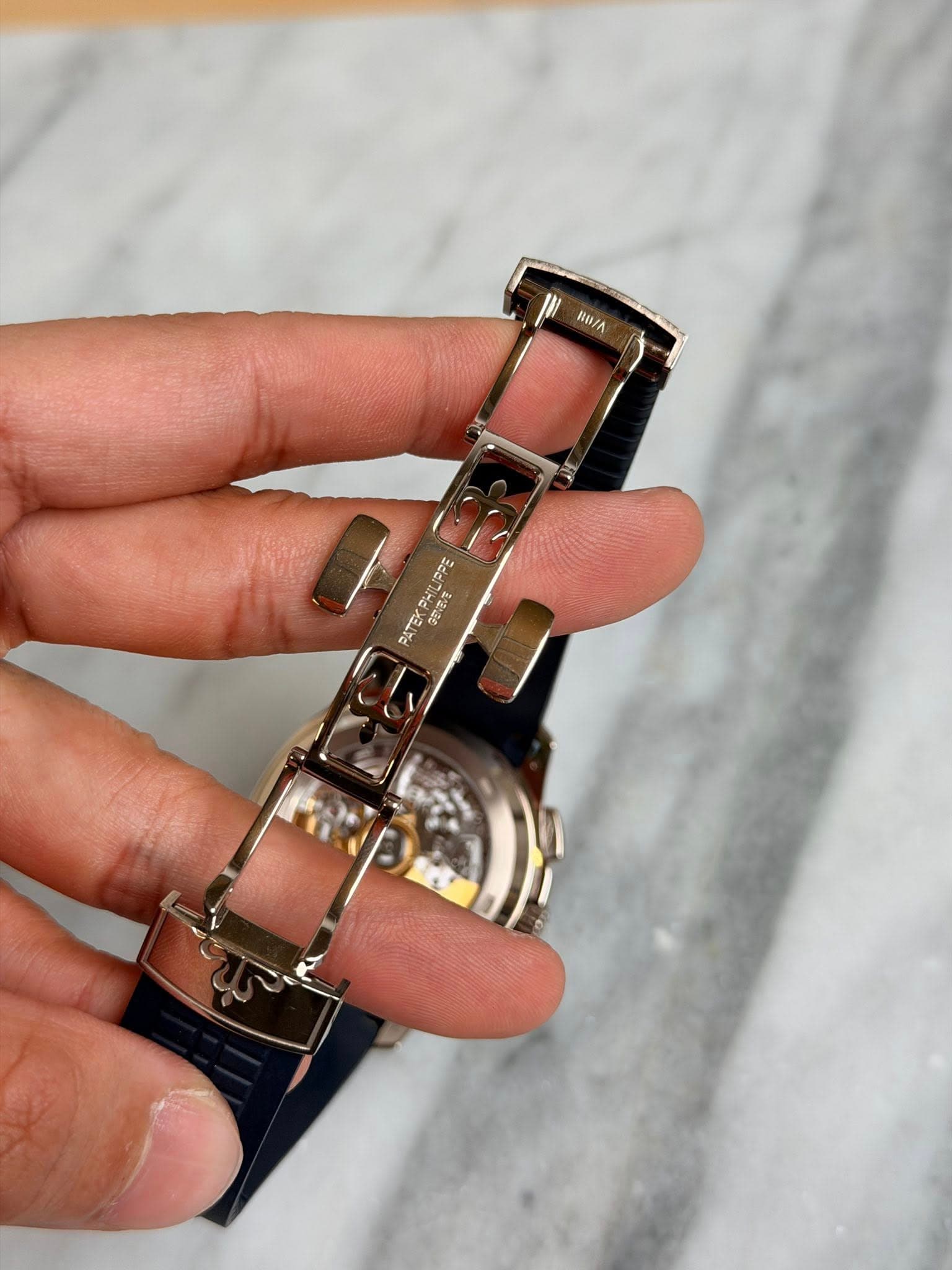 May be an image of digital watch and text
