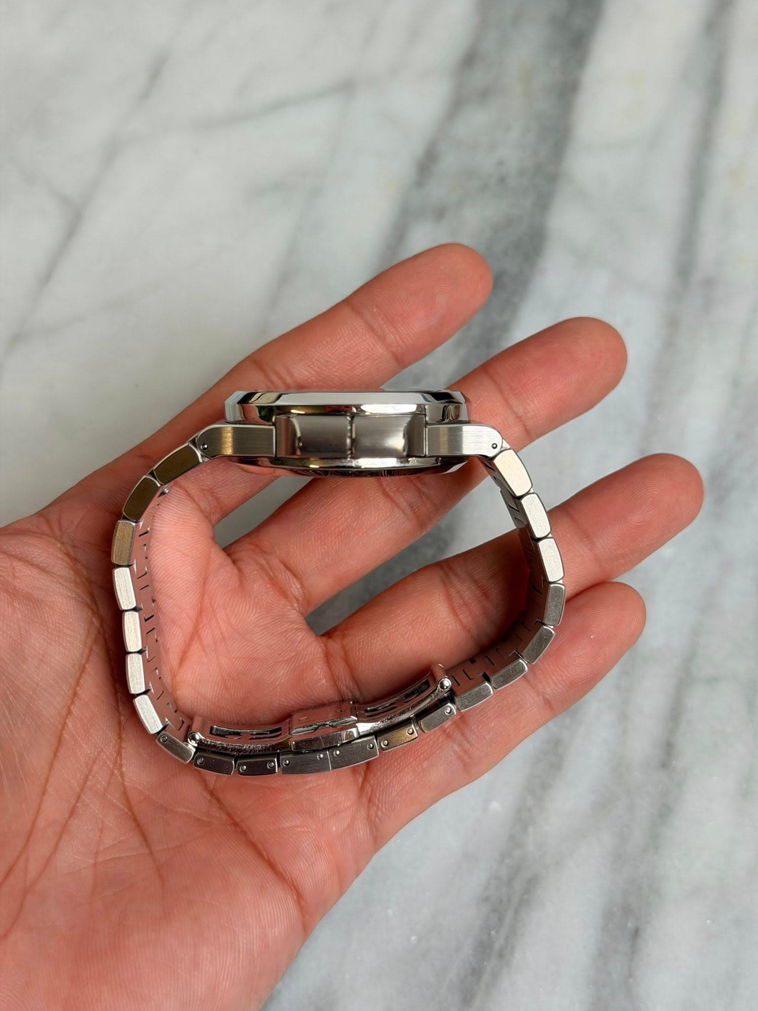 May be an image of digital watch