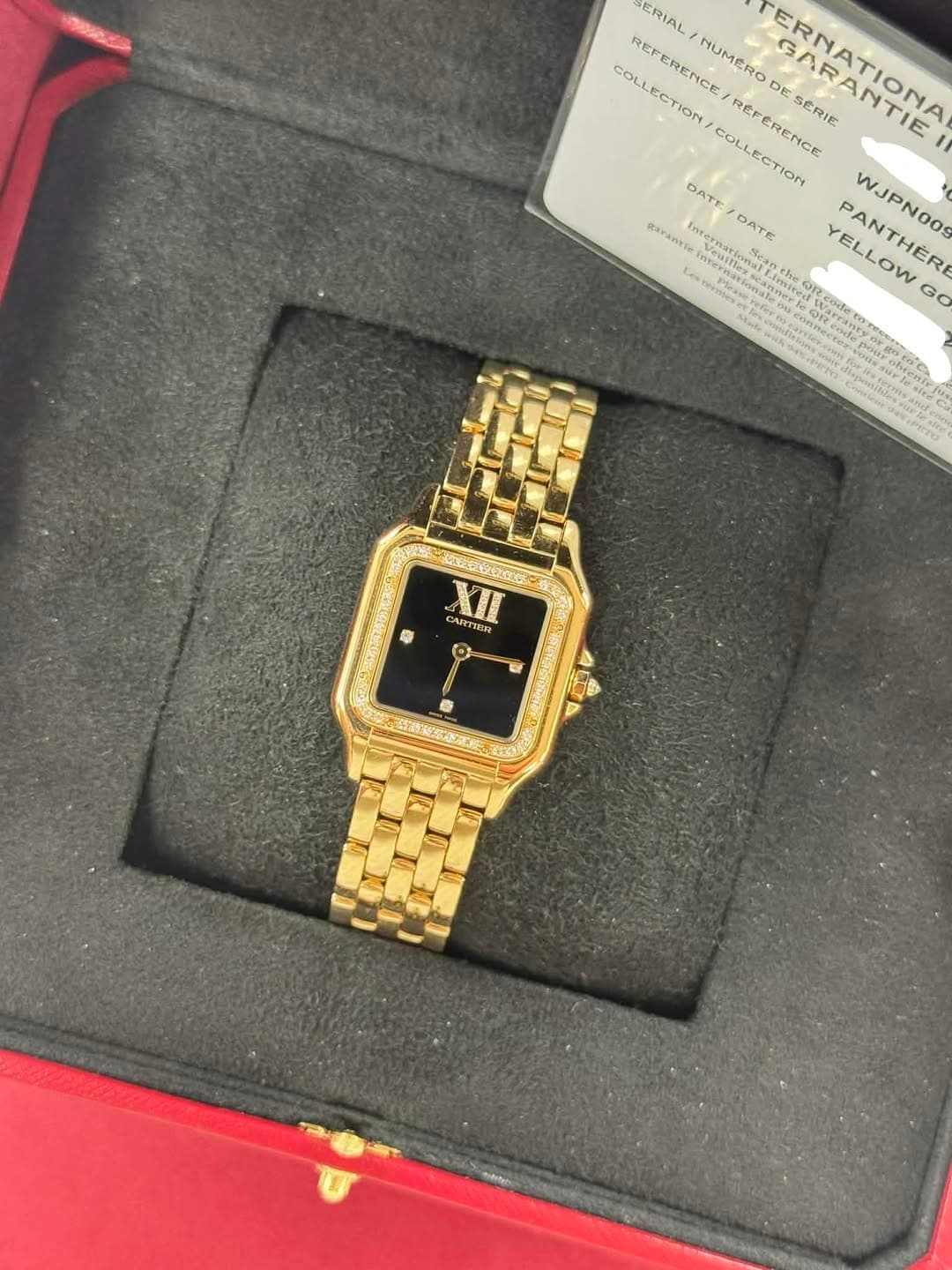 May be an image of wrist watch and text