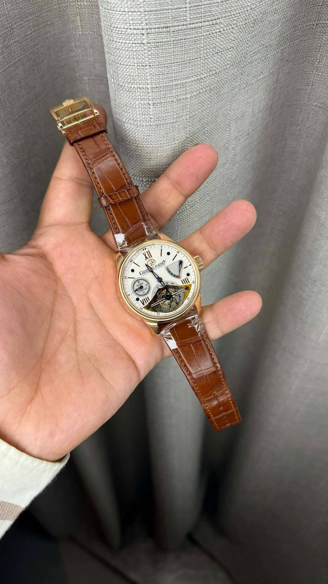 May be an image of wrist watch