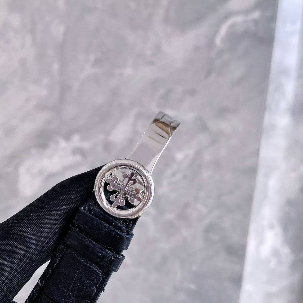 May be an image of wrist watch
