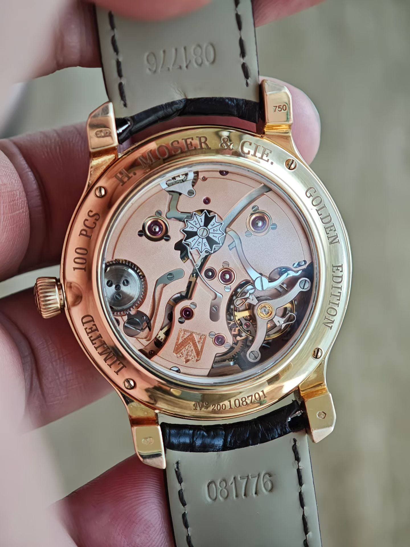 May be an image of wrist watch and text