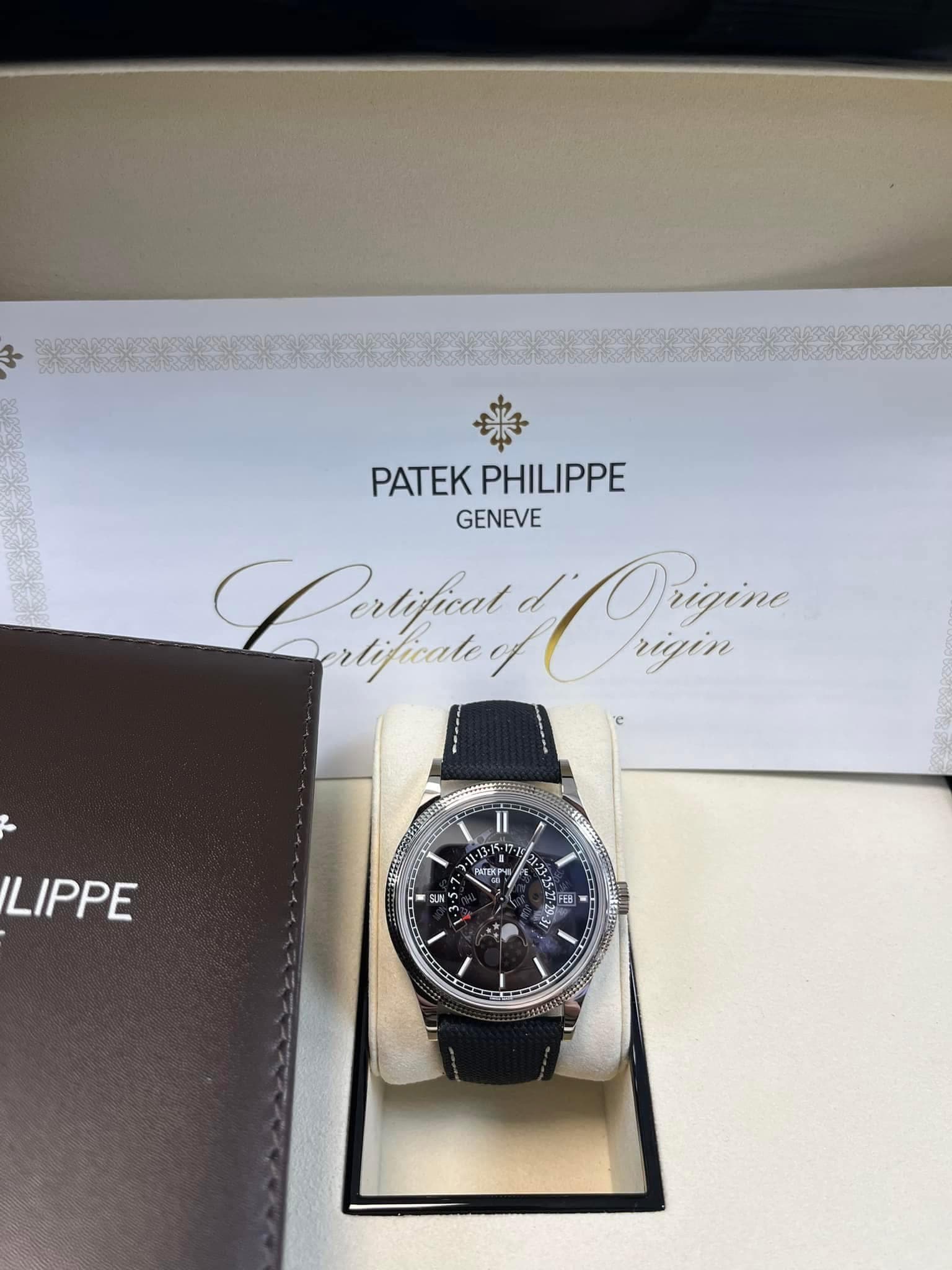 May be an image of wrist watch and text that says 'PATEKPHILIPPE PATEK PHILIPPE GENEVE Calfun refaty rtifical Ormin Origine rlificale rigin LIPPE n 13 代 TUP -22 21 は E i M FL -17 A…