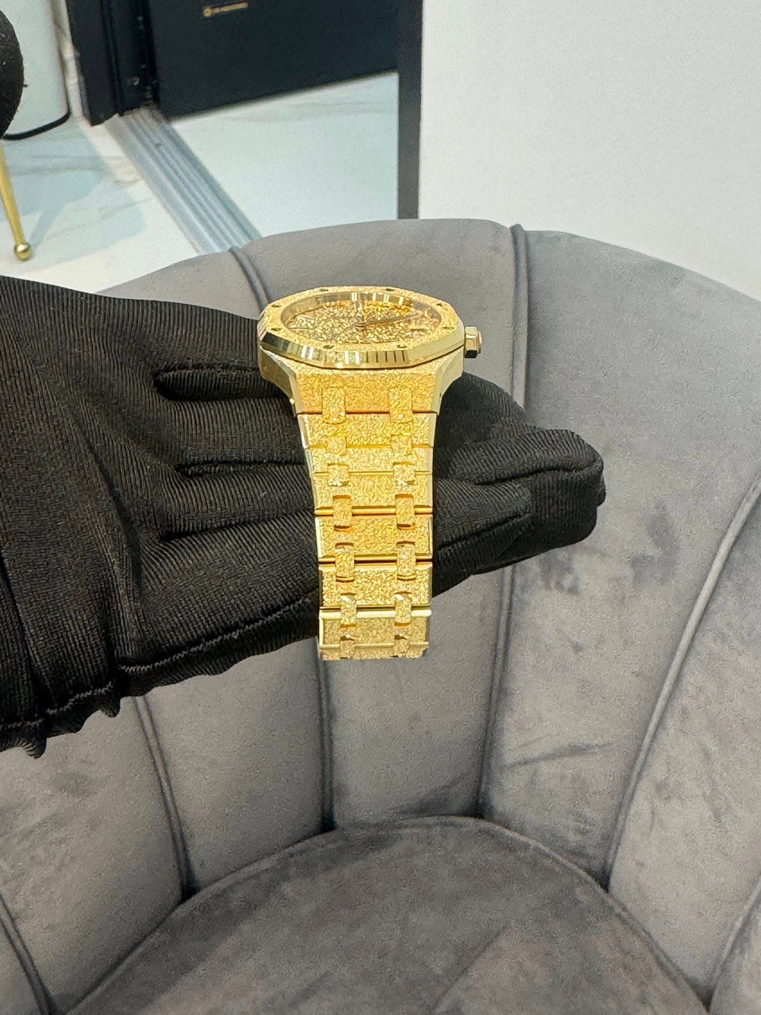May be an image of wrist watch and text