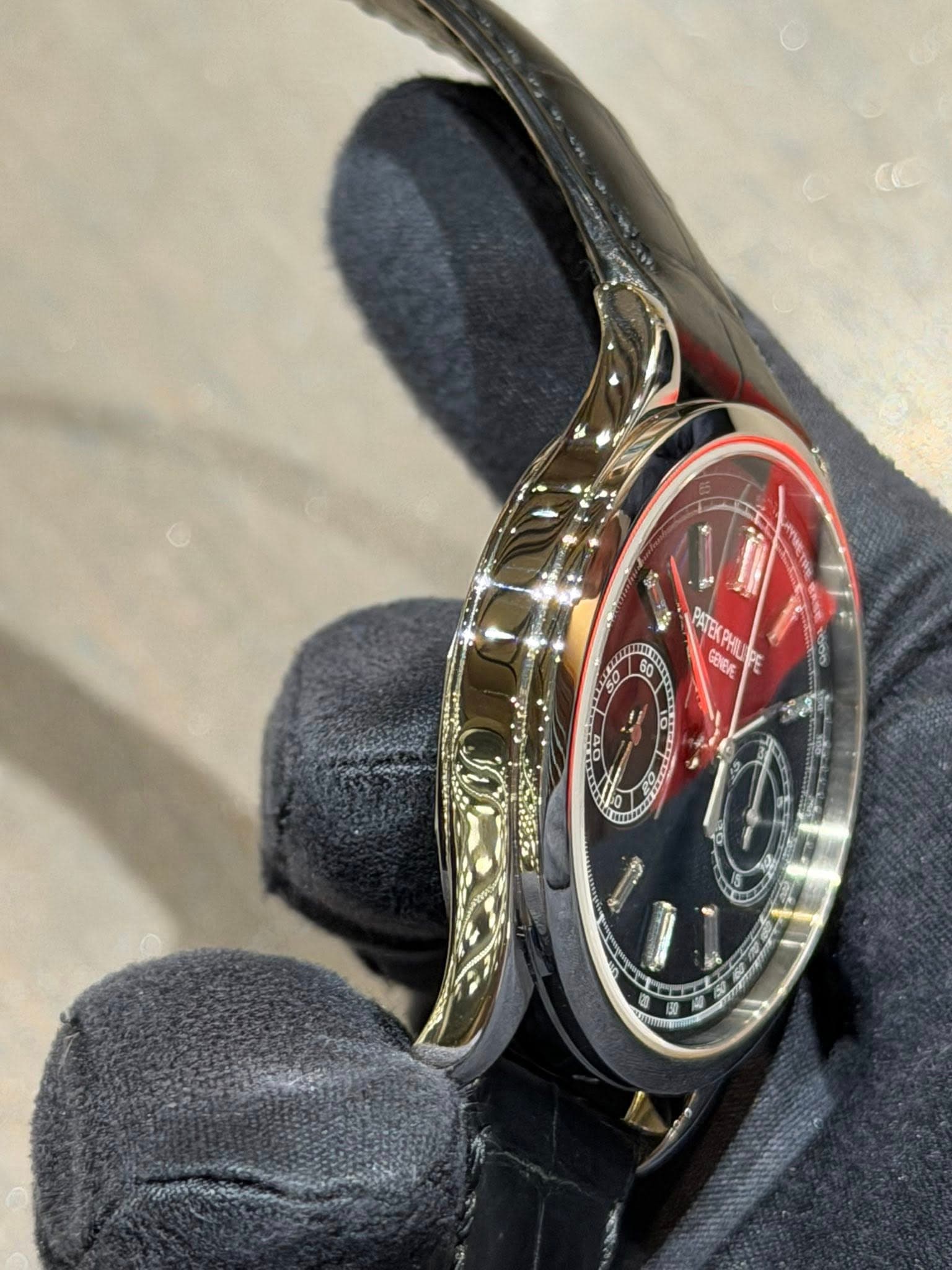 May be an image of wrist watch and text